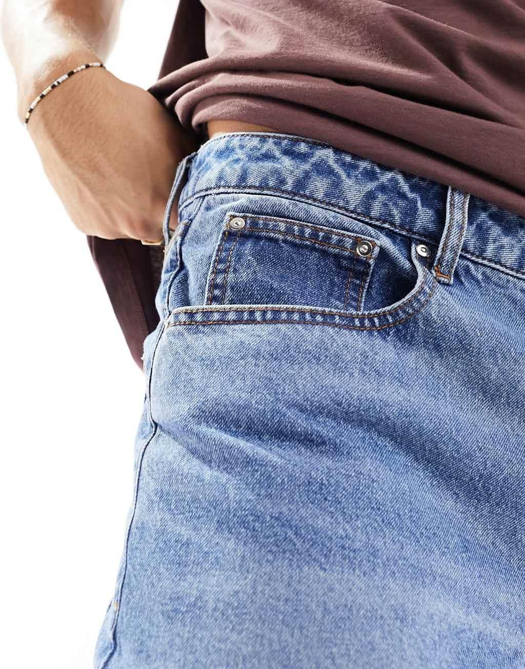 ASOS DESIGN baggy jeans in mid wash blue Product Image