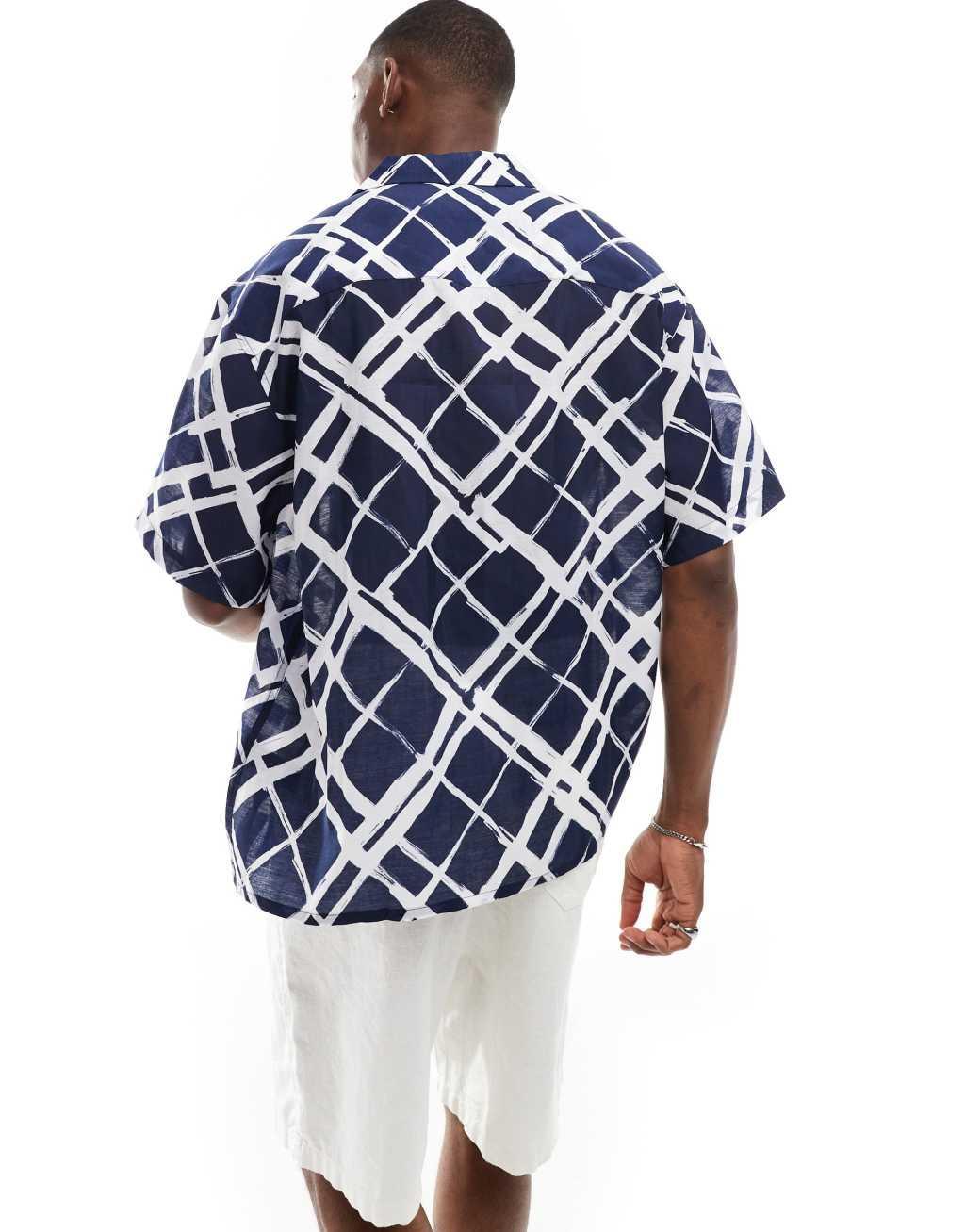 ASOS DESIGN oversized camp collar shirt with brush stroke plaid print in navy Product Image