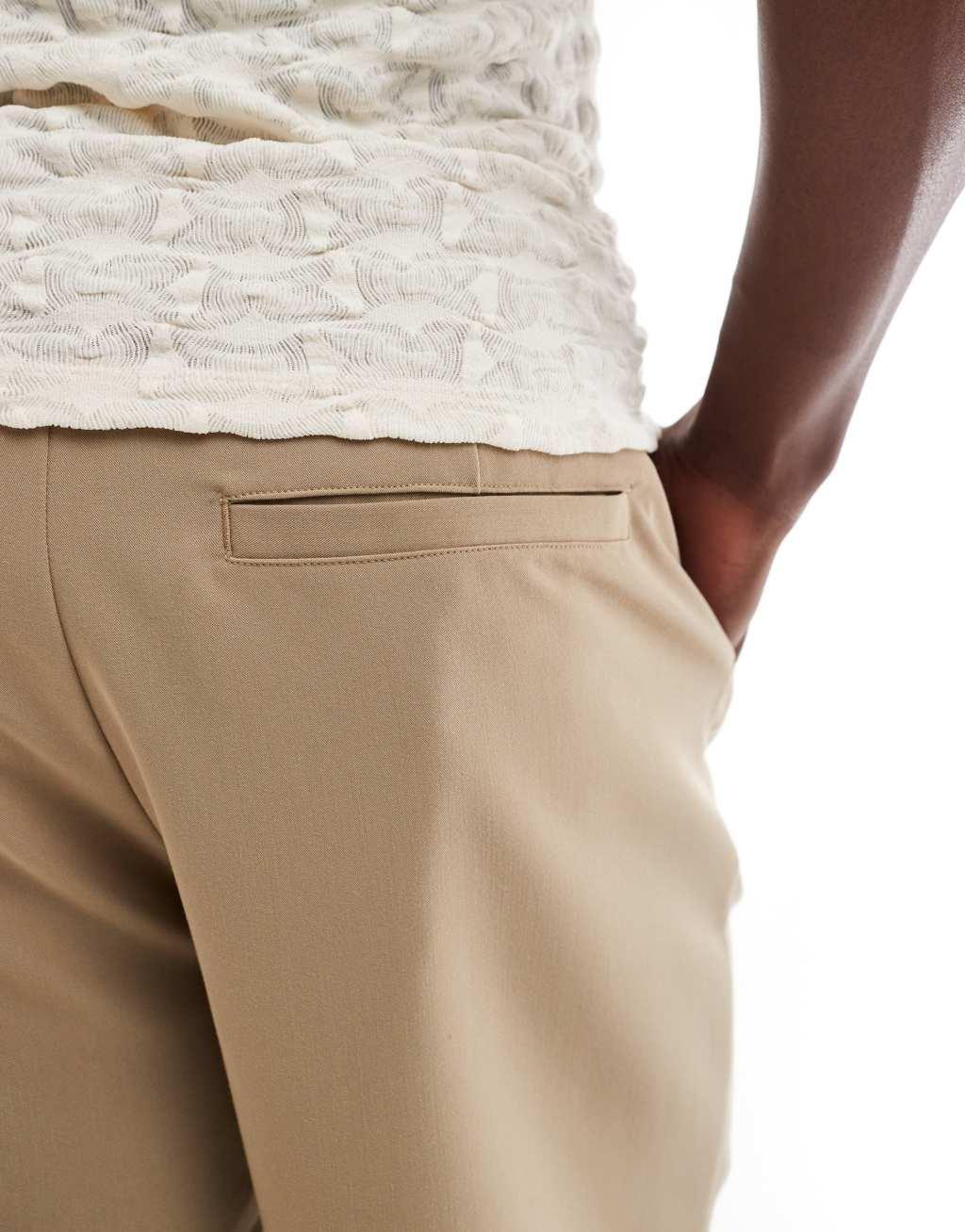 ONLY & SONS loose fit pleated tailored shorts in beige Product Image