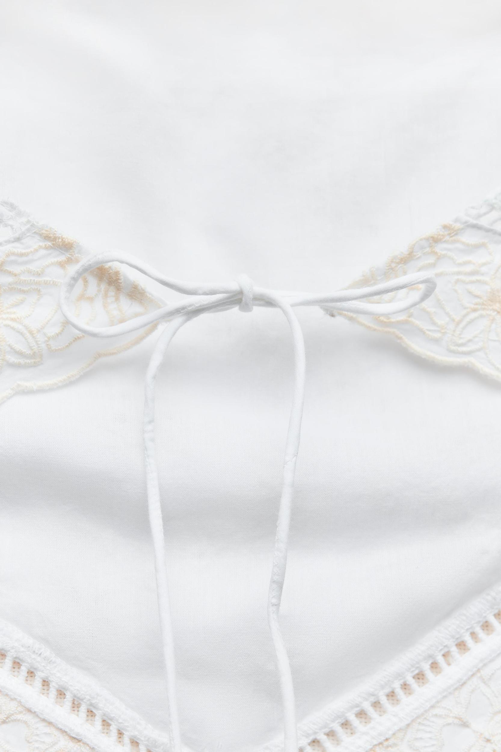 EMBROIDERED STRAPLESS TOP Product Image