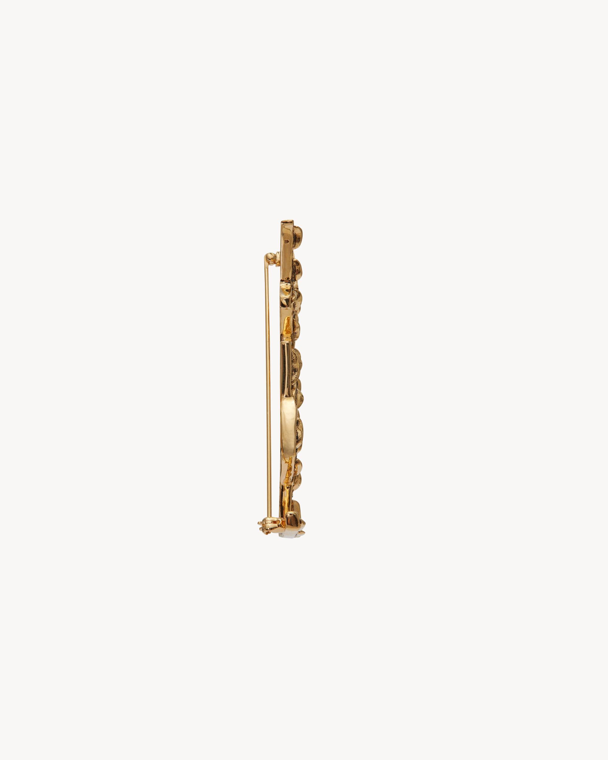 CASSANDRE crocodile brooch in metal Product Image