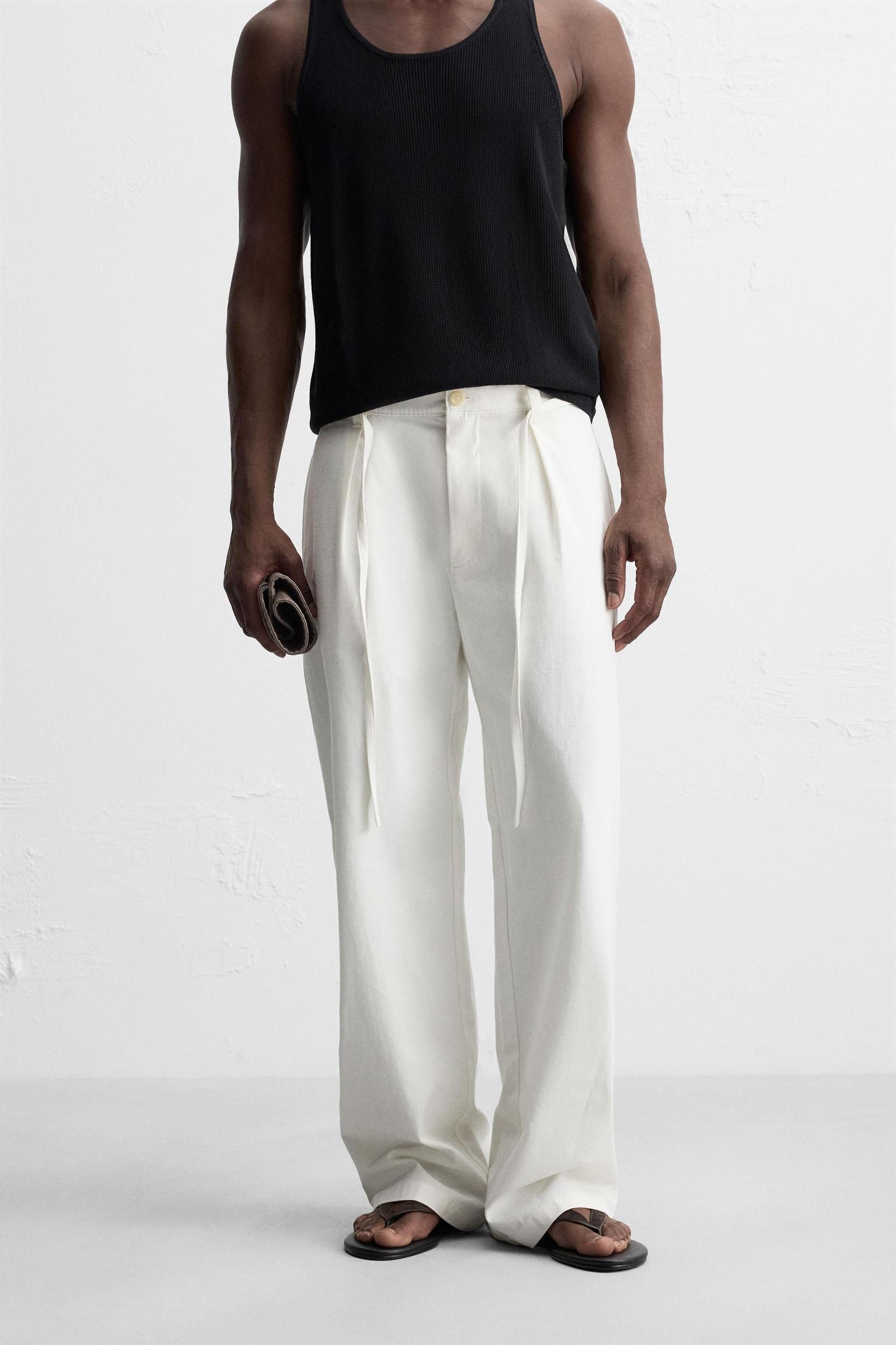 RELAXED FIT PLEATED PANTS Product Image