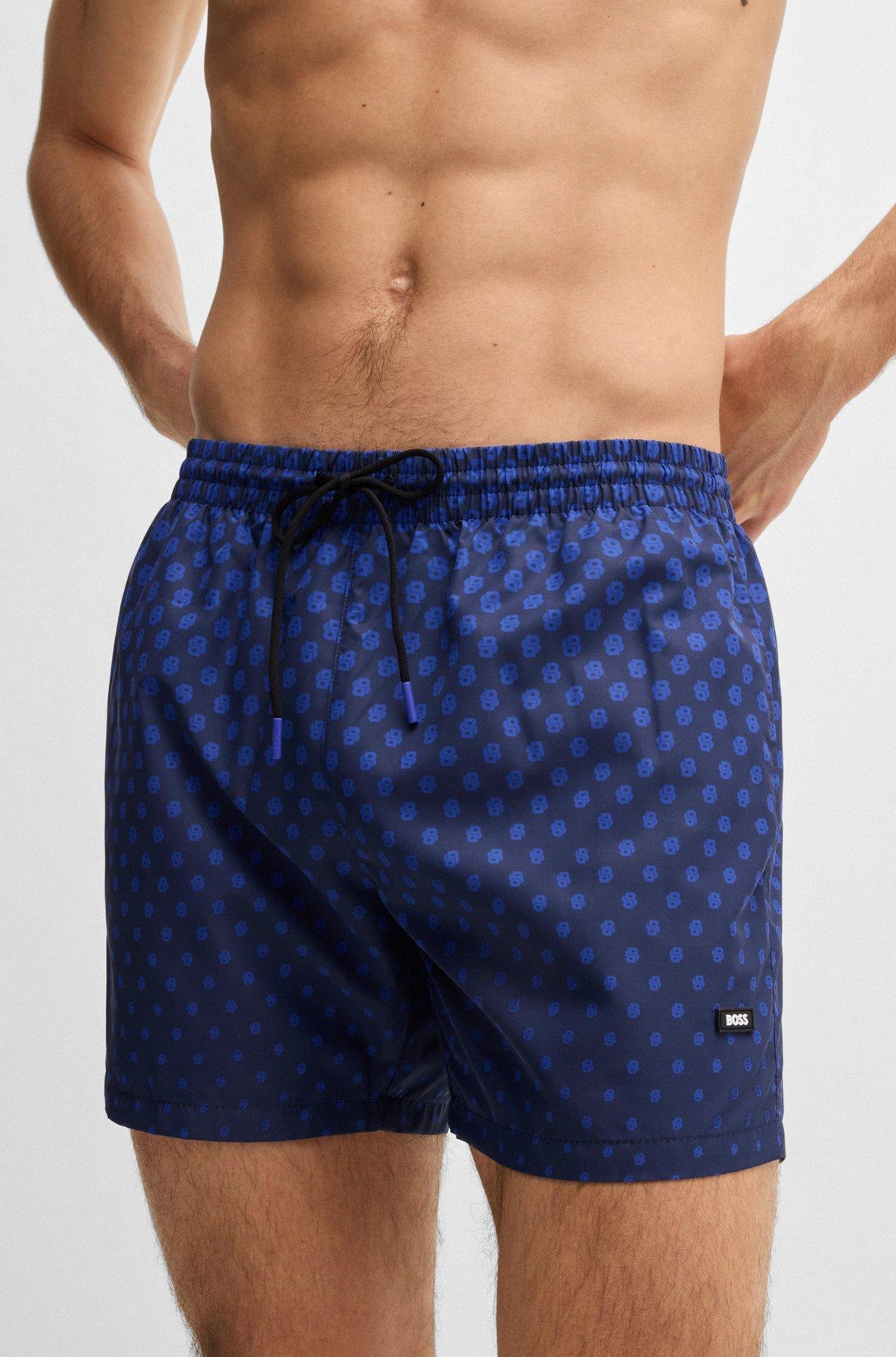 Printed swim shorts with logo detail Product Image