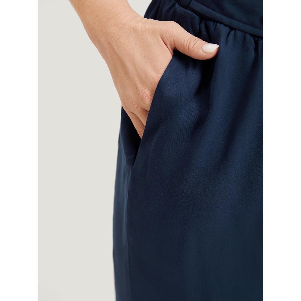 Plus Size Plain Pocket Paperbag Waist Button Detail Pants Women Indigo Elegant Straight Leg High Rise Dailywear Pants BloomChic 26/4X Product Image