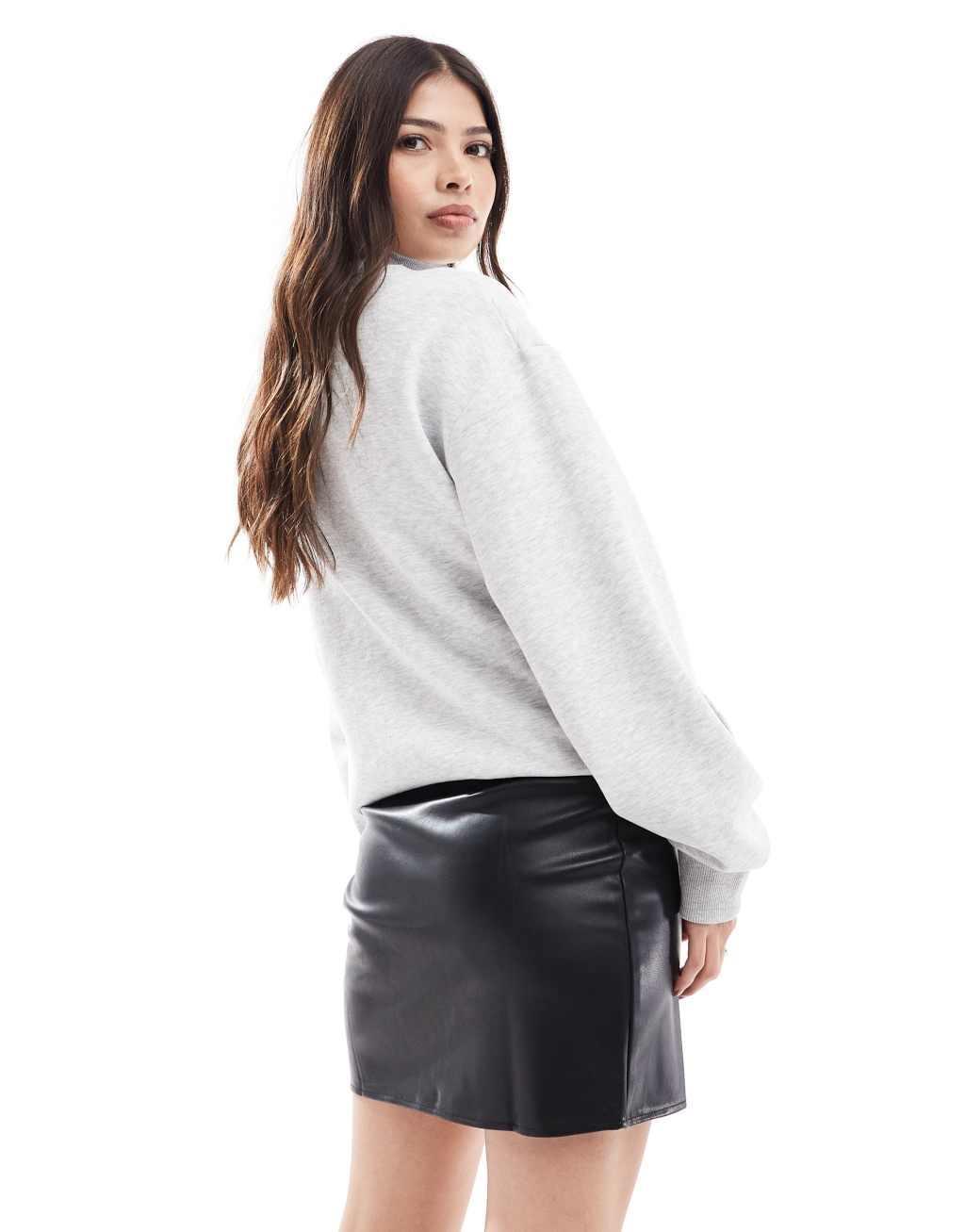 ASOS DESIGN split front leather look mini skirt in black Product Image