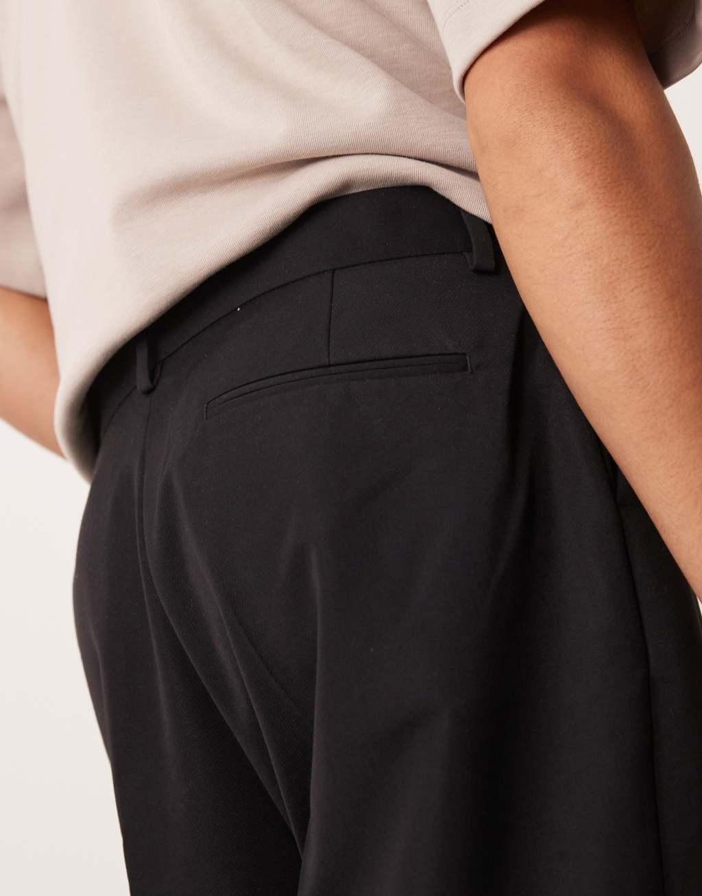 ASOS DESIGN smart balloon pants with front pleat in black Product Image