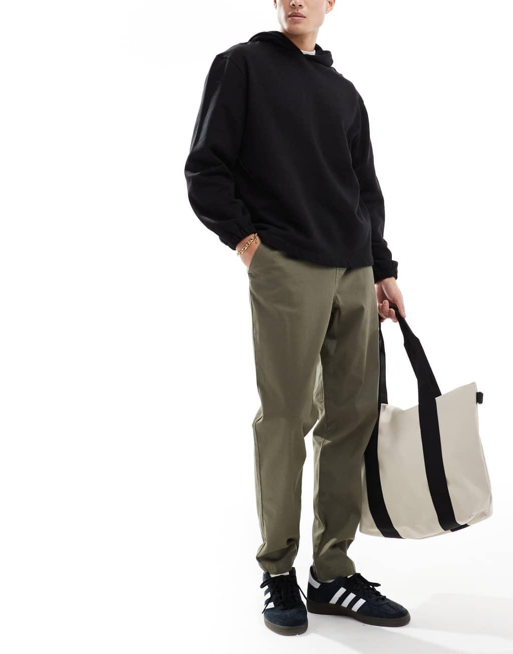 ASOS DESIGN tapered pull on chino with elastic waist in khaki Product Image