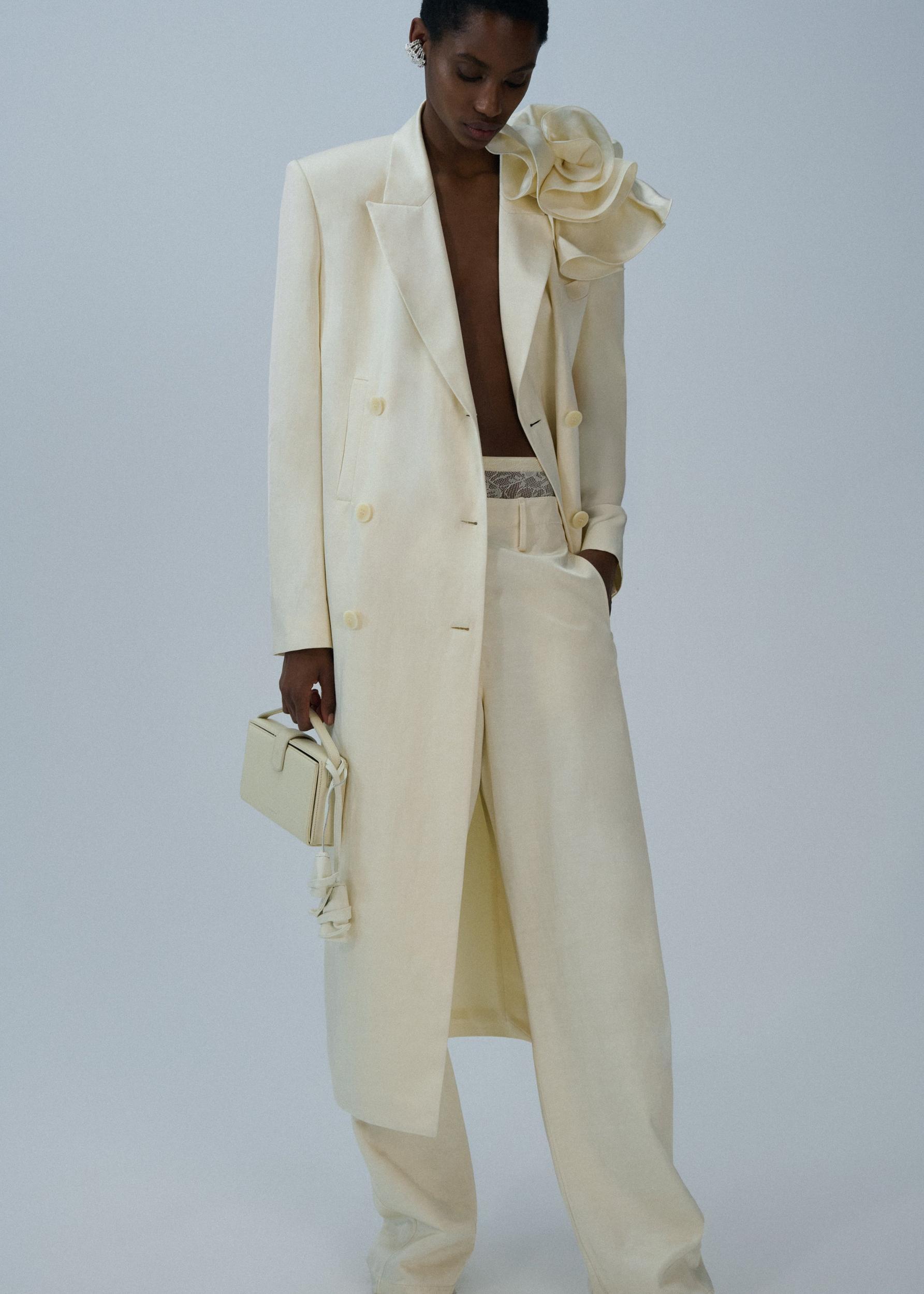 Double breasted flower appliqué coat in cream Product Image