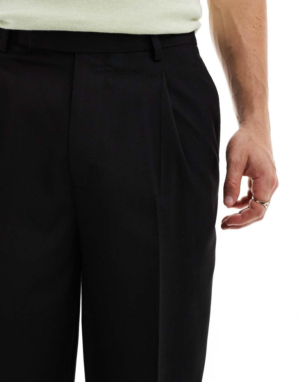 ASOS DESIGN oversized tapered fit dress pants with front pleats in black Product Image