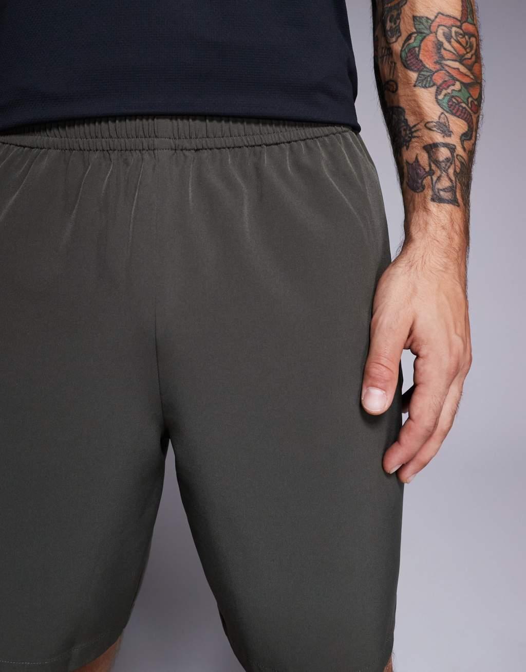 ASOS 4505 Icon 7 inch quick dry training shorts with zip pockets in khaki Product Image