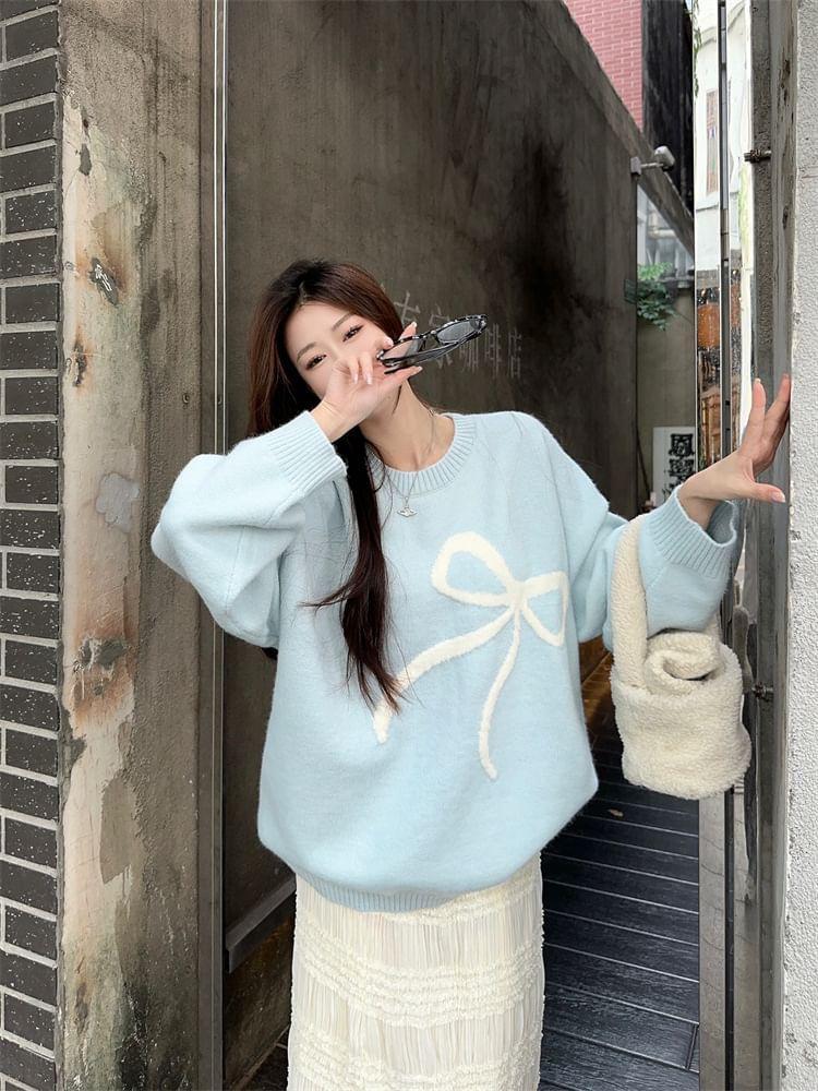 Round Neck Bow Print Oversized Sweater / Mid Rise Plain Ruffle Trim Maxi Skirt / Mid Rise Plain Wide Leg Pants Product Image
