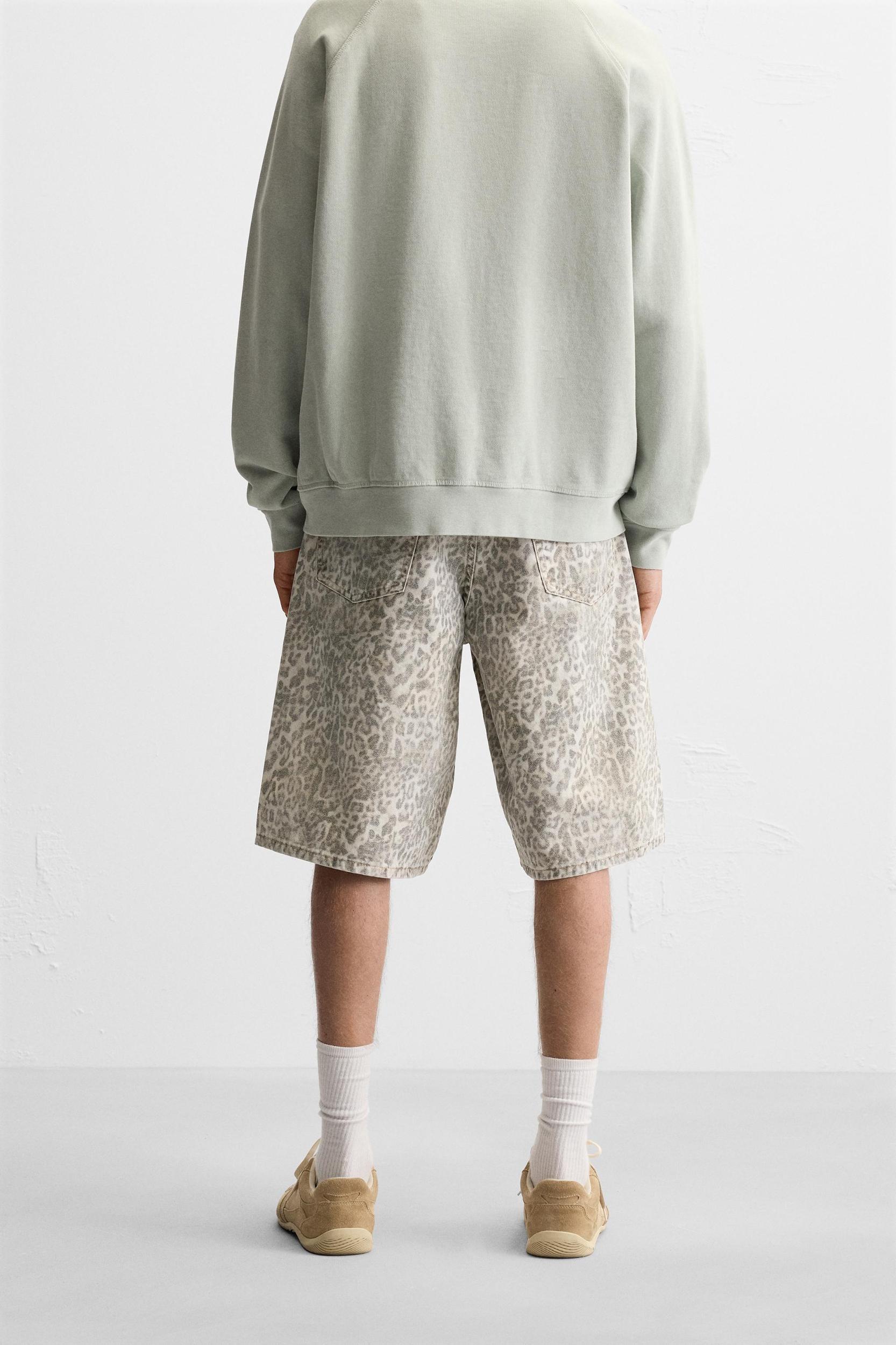 DENIM ANIMAL PRINT SHORTS Product Image
