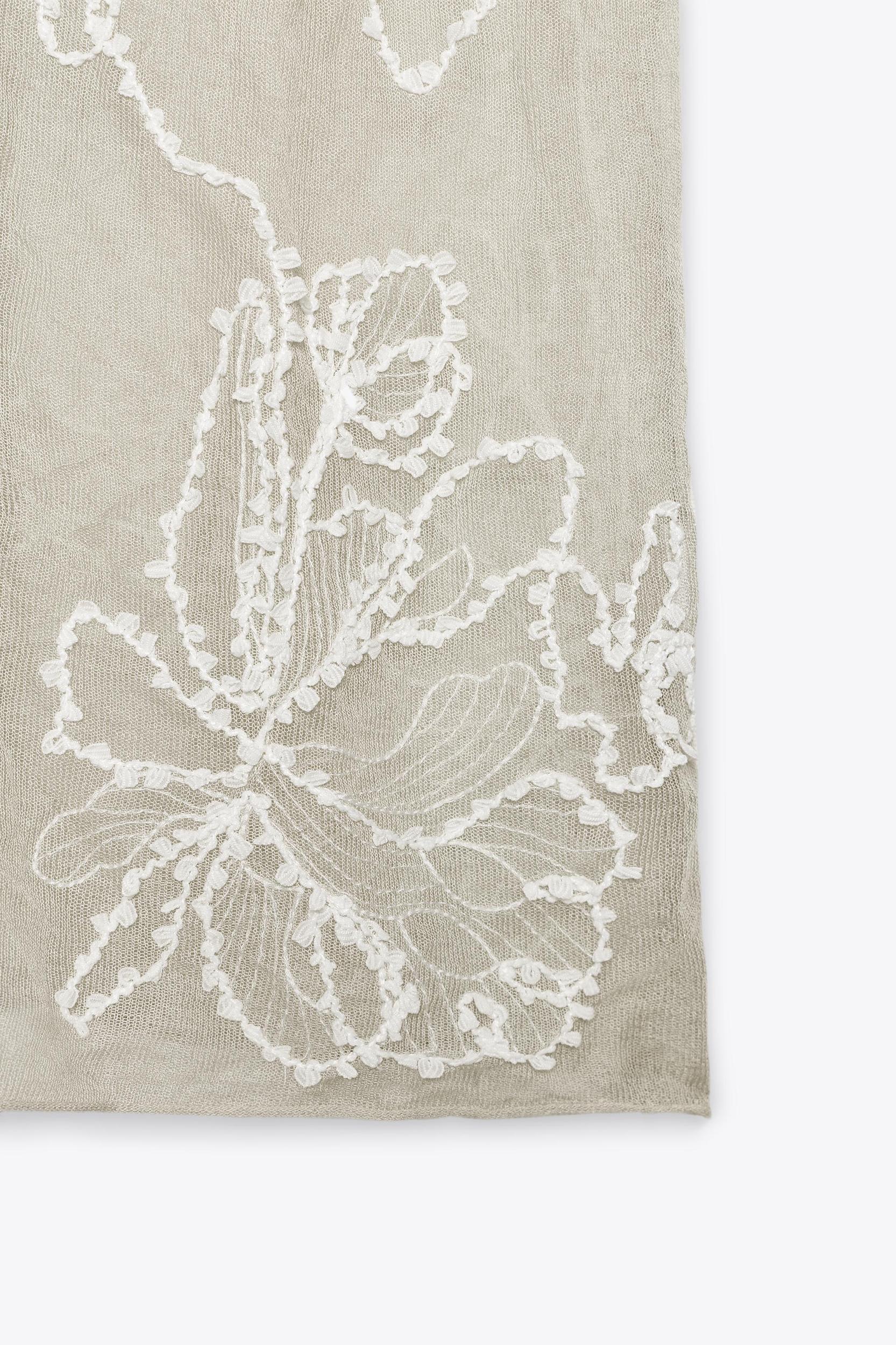 SEMI-SHEER STRUCTURED KNIT TOP Product Image