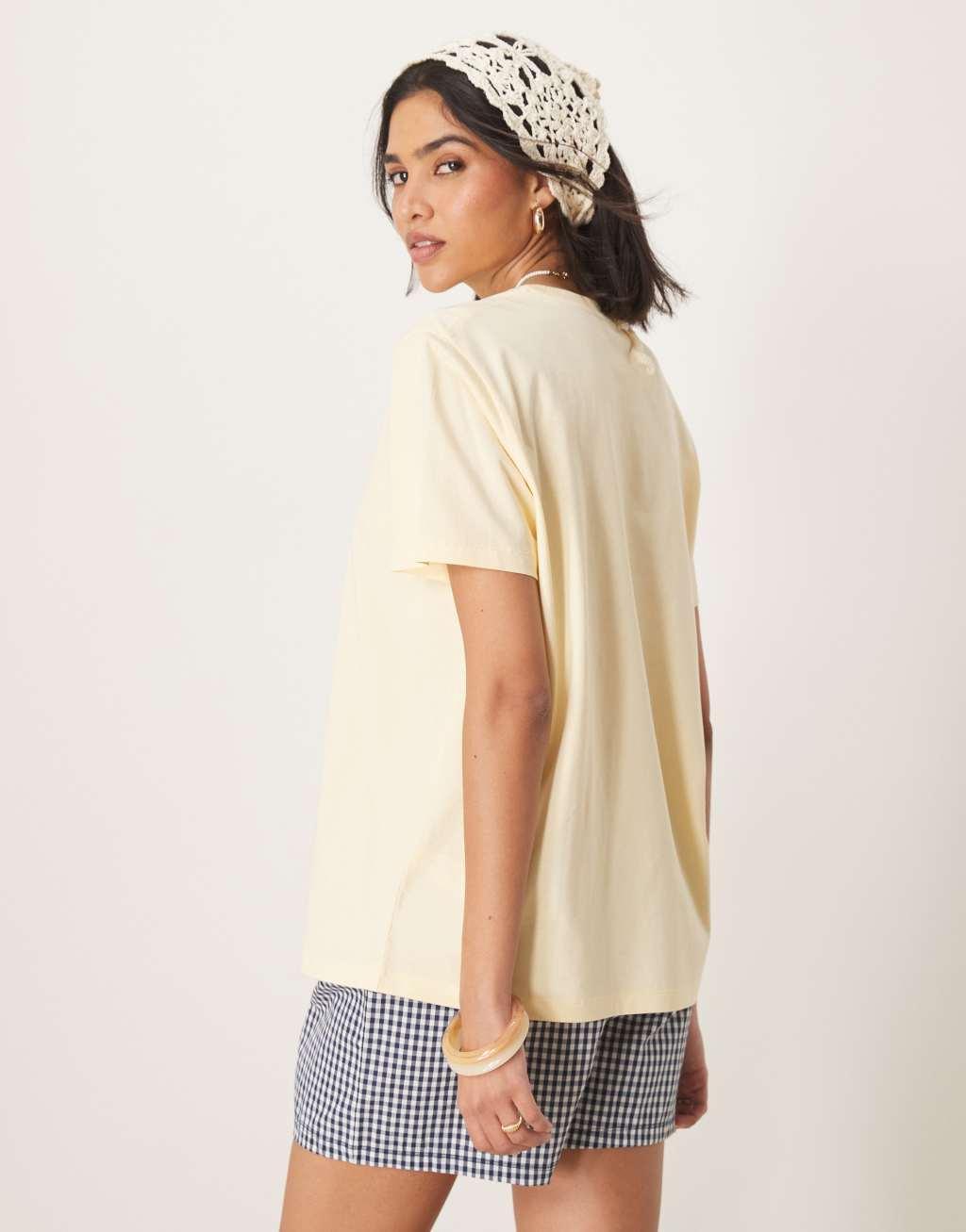 ASOS DESIGN regular fit T-shirt with Latin Quarter graphic in lemon Product Image