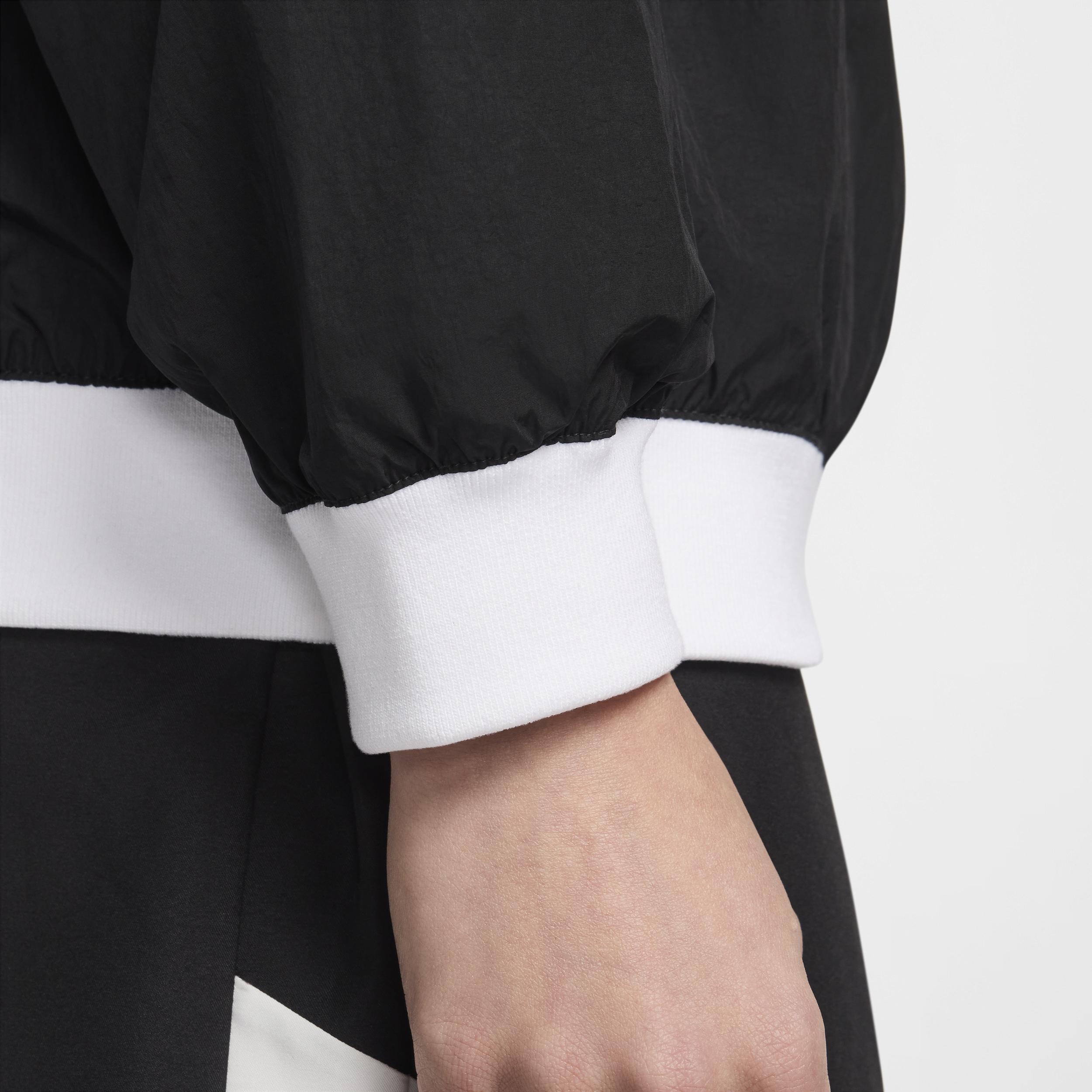 Nike Sportswear Essential Women's Loose UV Woven Long-Sleeve V-Neck Top Product Image