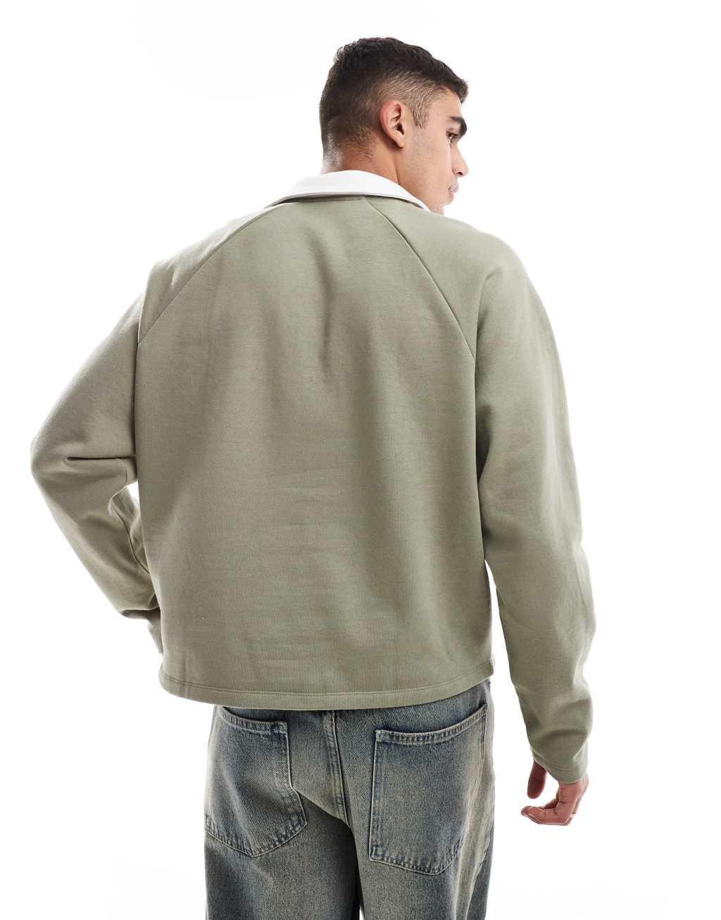 ASOS DESIGN rugby polo sweatshirt with raglan sleeves in khaki Product Image