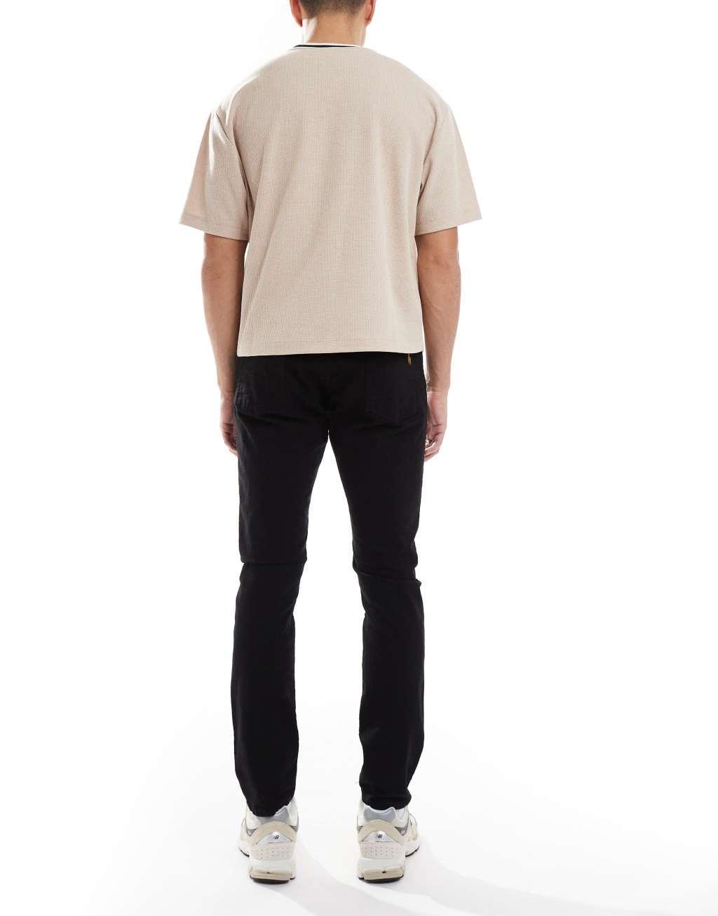 Polo Ralph Lauren Sullivan icon logo back pocket slim fit jeans in black Product Image