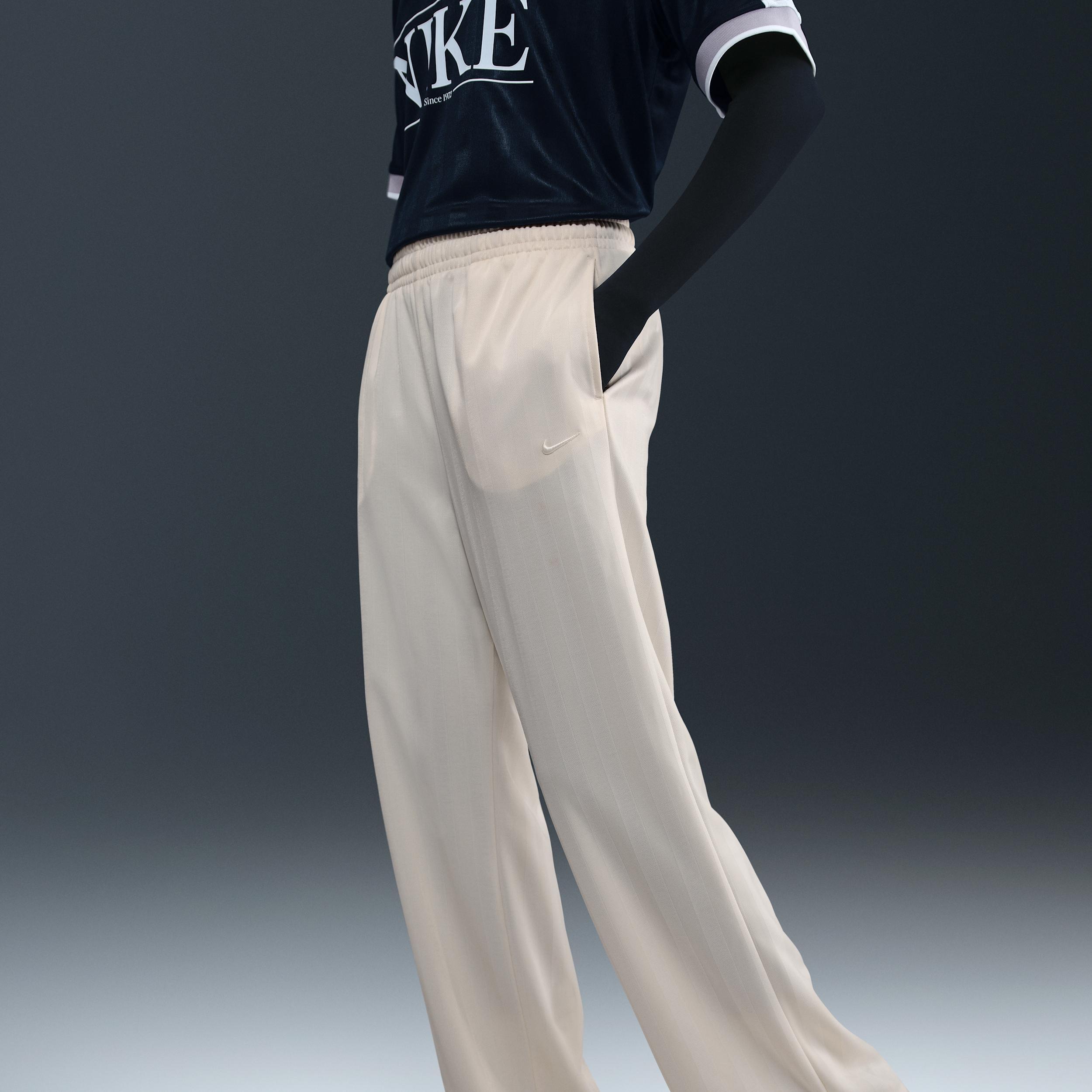 Nike Sportswear Women's Mid-Rise Loose Jacquard Striped Track Pants Product Image