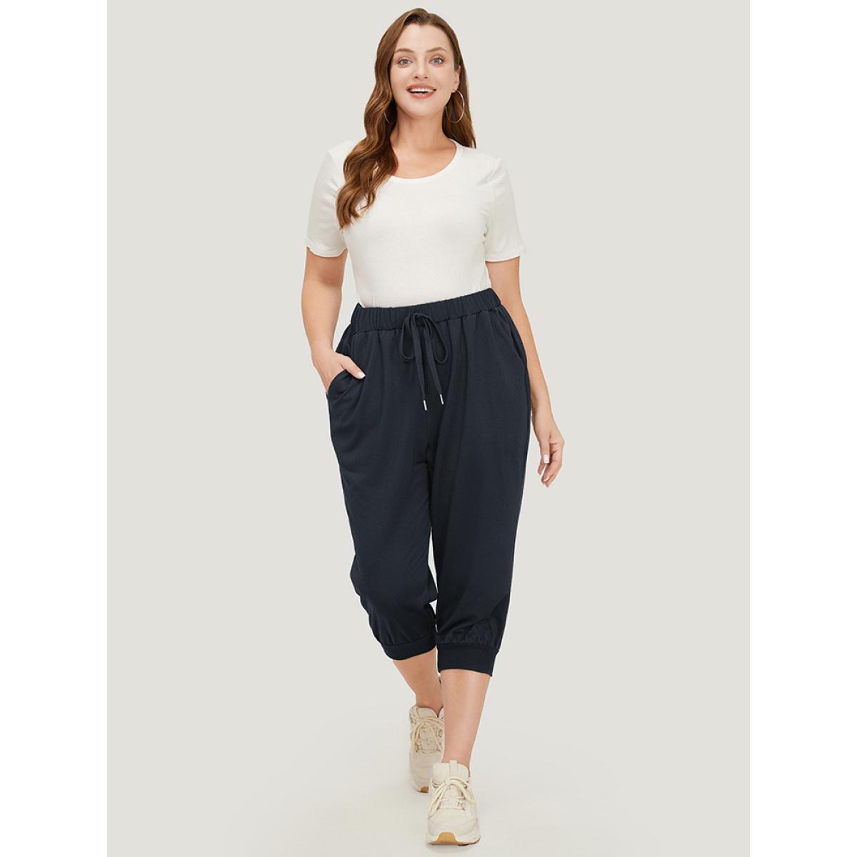 Plus Size Solid Knot Front Pocket Carrot Pants Women Indigo Casual High Rise Dailywear Pants BloomChic 30/6X Product Image