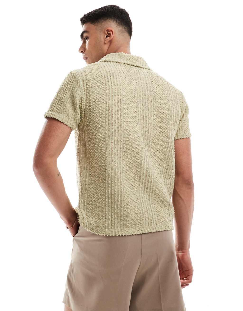 ASOS DESIGN boxy relaxed textured polo with revere neck in khaki Product Image