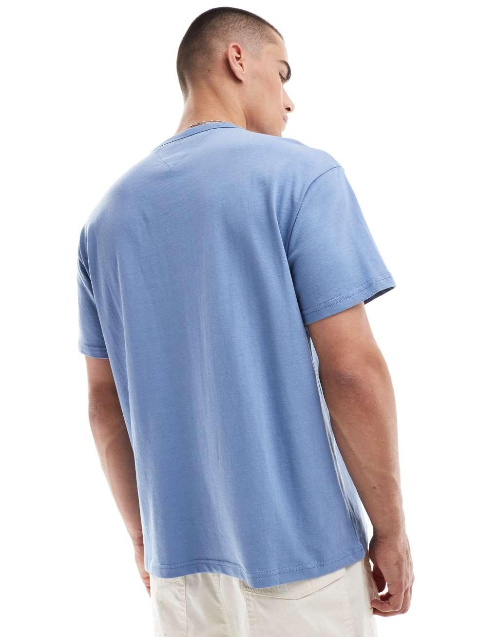 Tommy Jeans relaxed badge T-shirt in blue Product Image