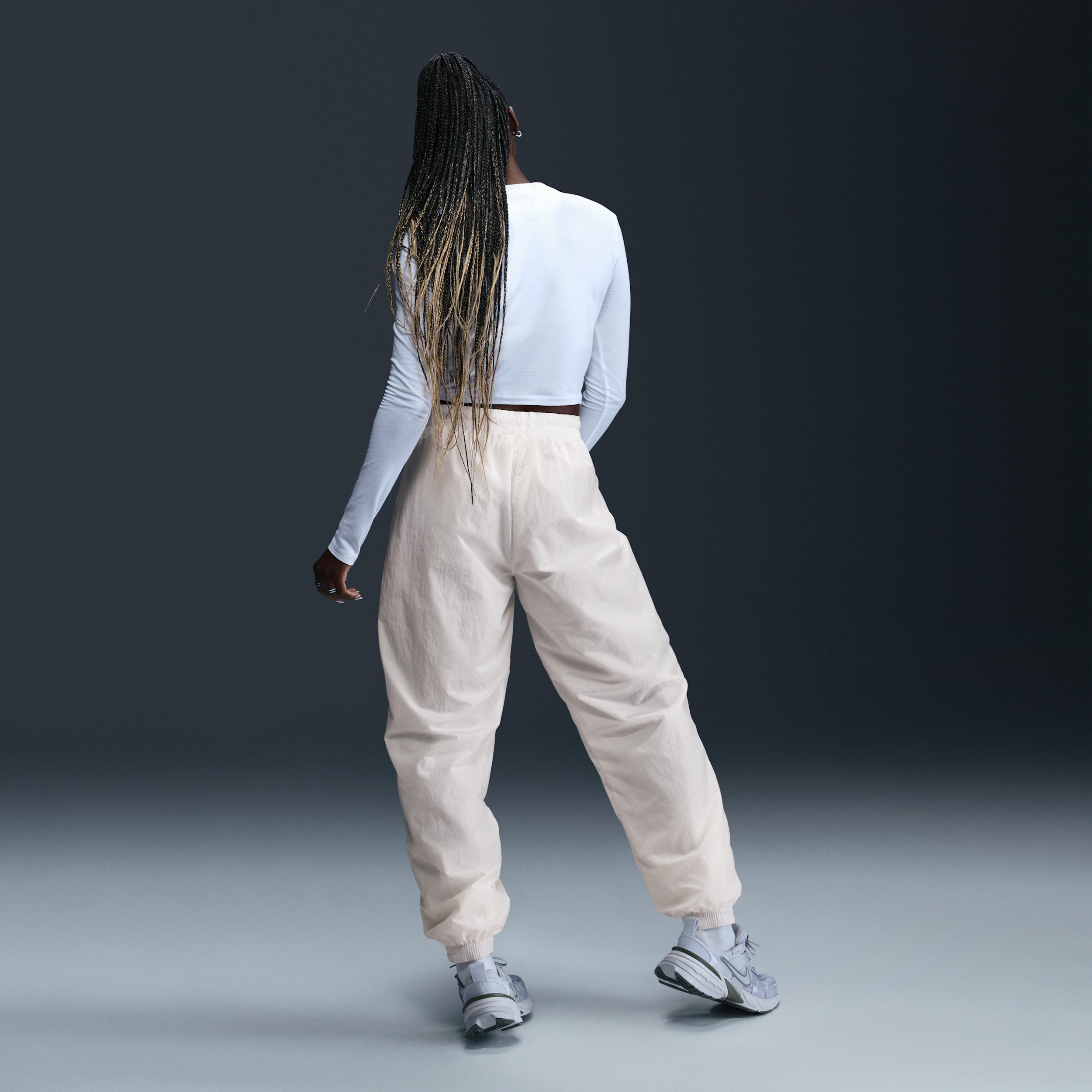 Nike Sportswear Essential Women's Mid-Rise Oversized Woven Joggers Product Image