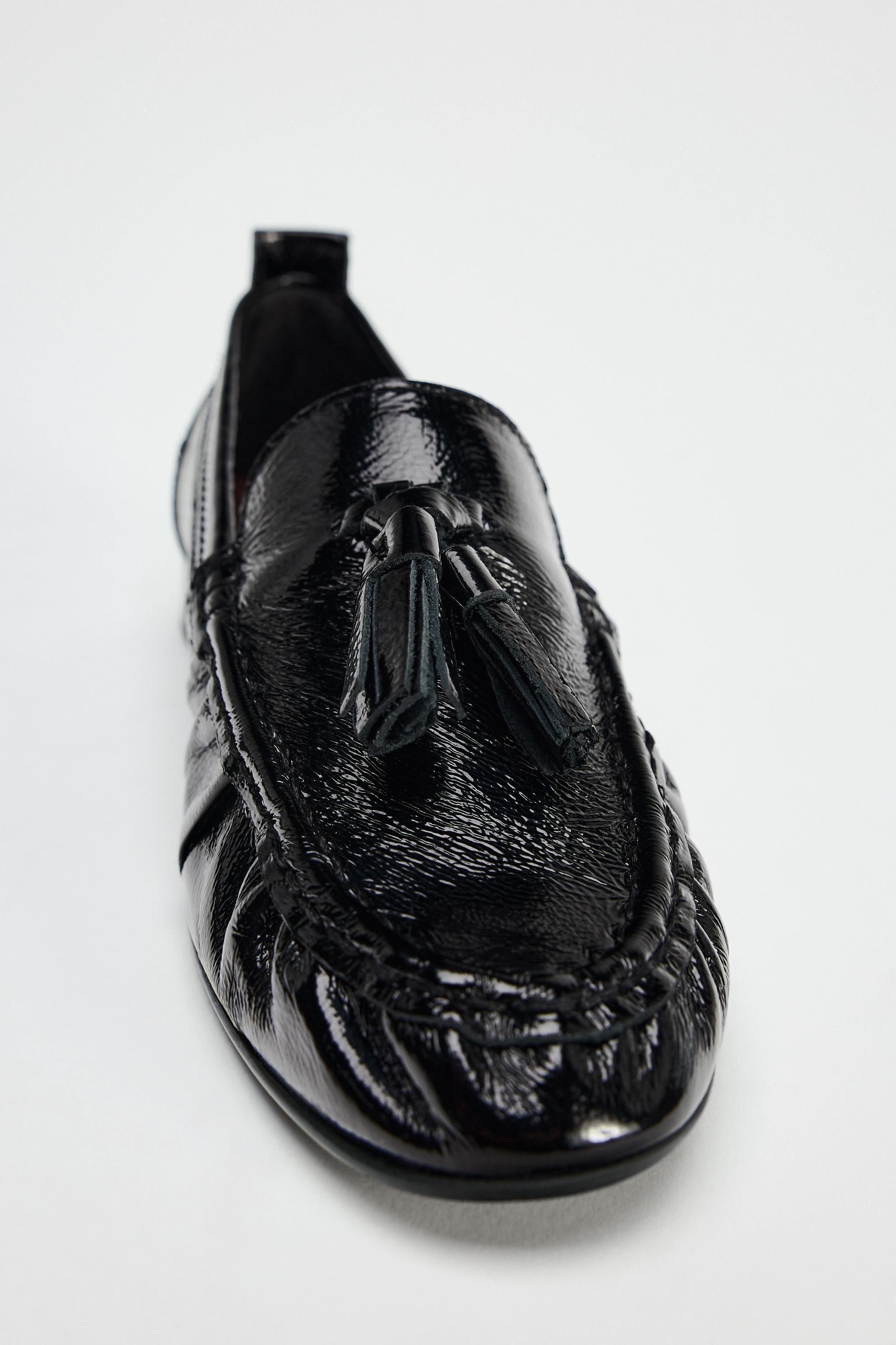LEATHER TASSELED LOAFERS Product Image