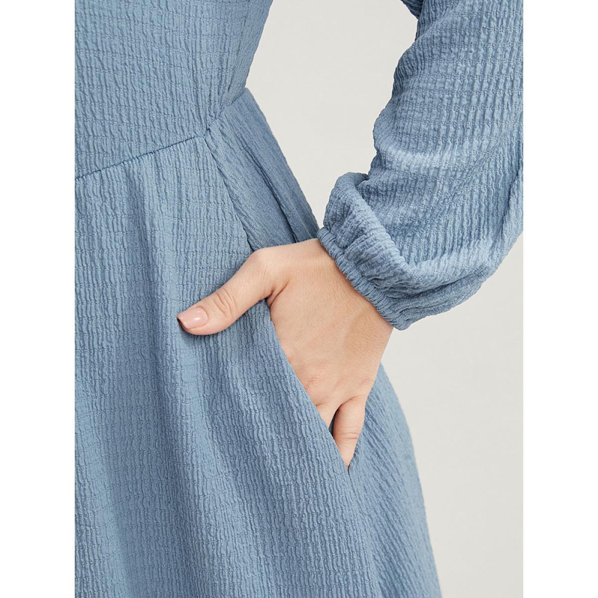 Plus Size Solid Textured Notched Pocket Lantern Sleeve Ruffle Hem Dress LightBlue Women Elegant Pocket V-neck Elbow-length sleeve Curvy Midi Dress BloomChic 12/L Product Image