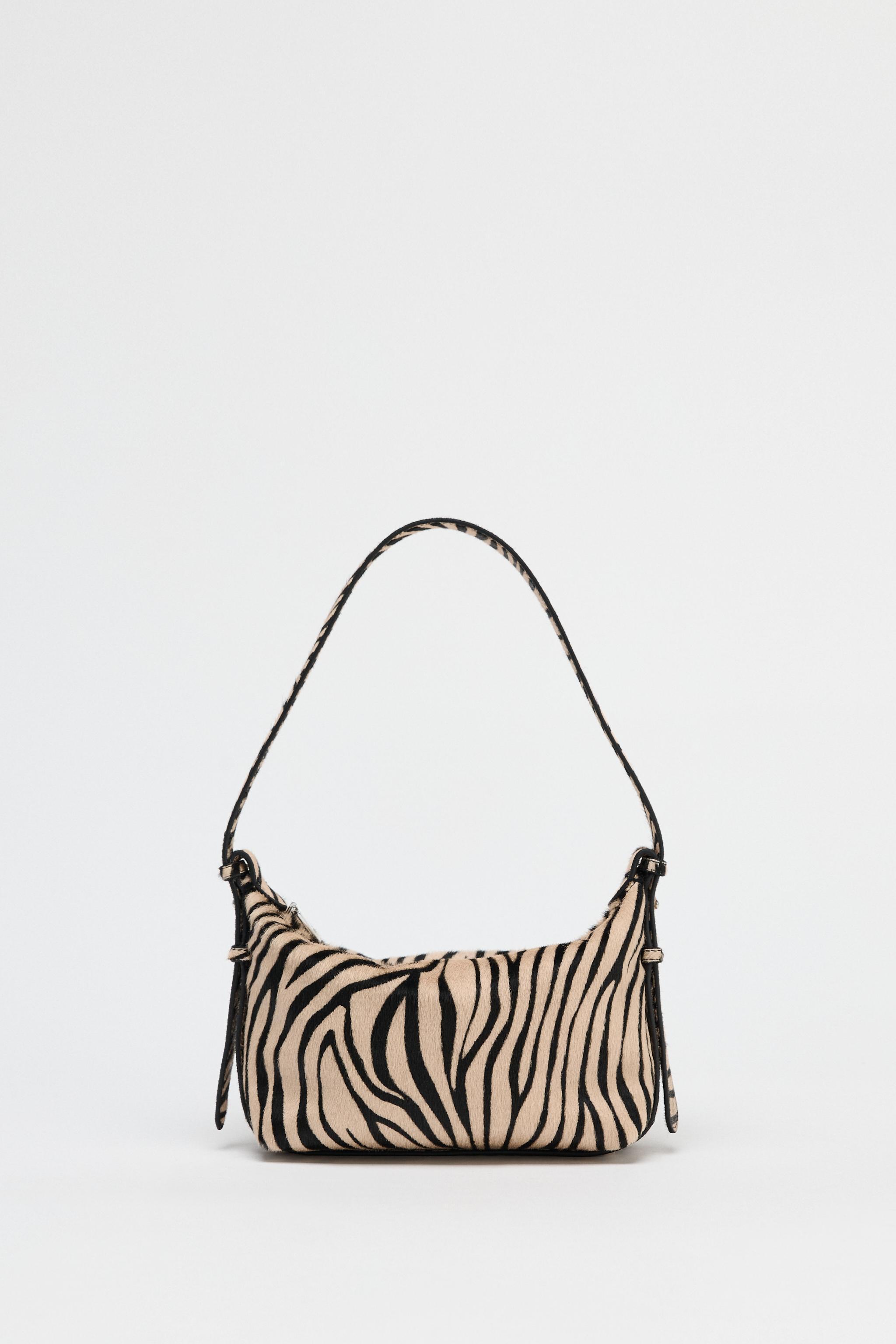 ANIMAL PRINT LEATHER AND HAIR SHOULDER BAG Product Image