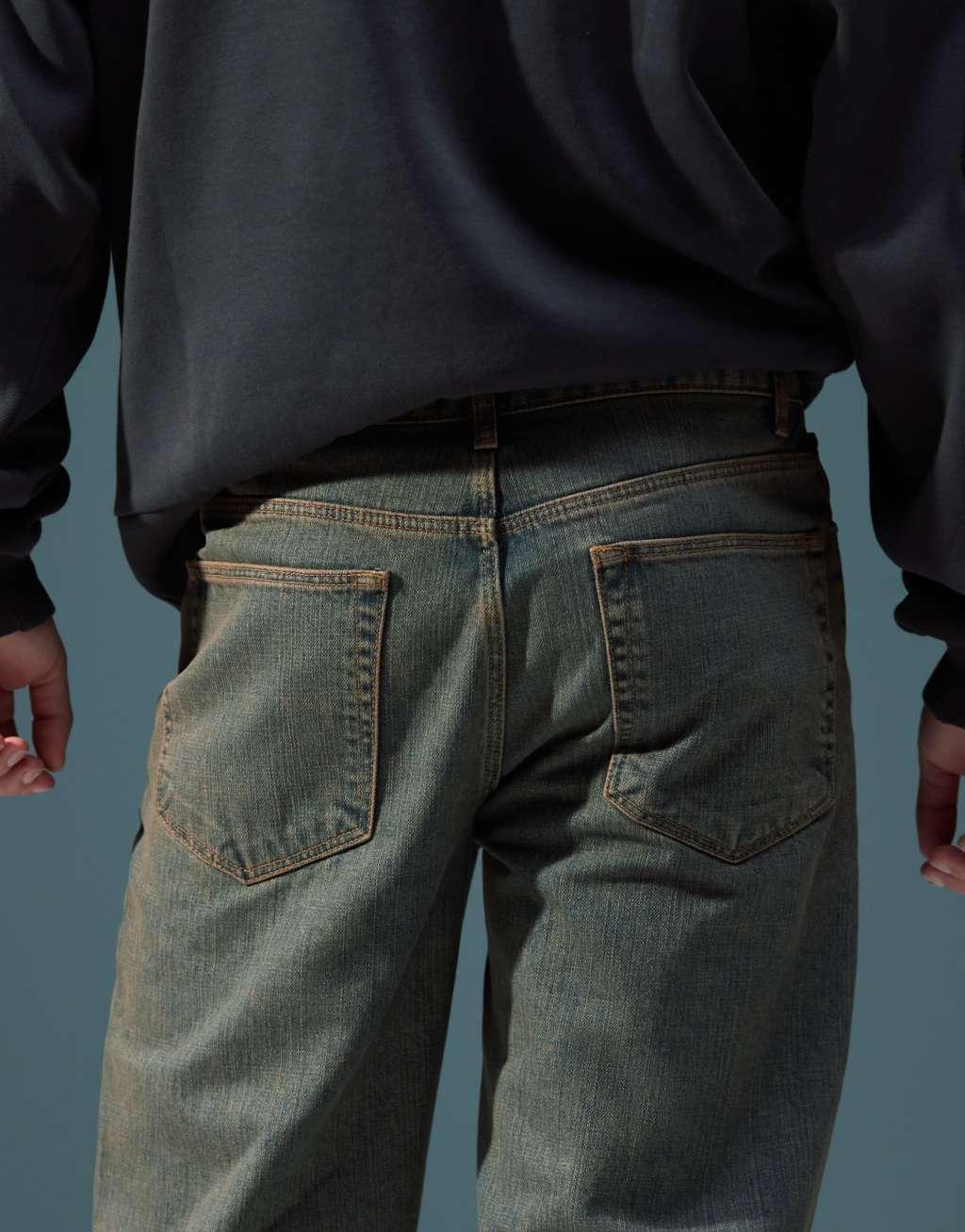 ASOS DESIGN wide flare jeans in light wash with tint Product Image