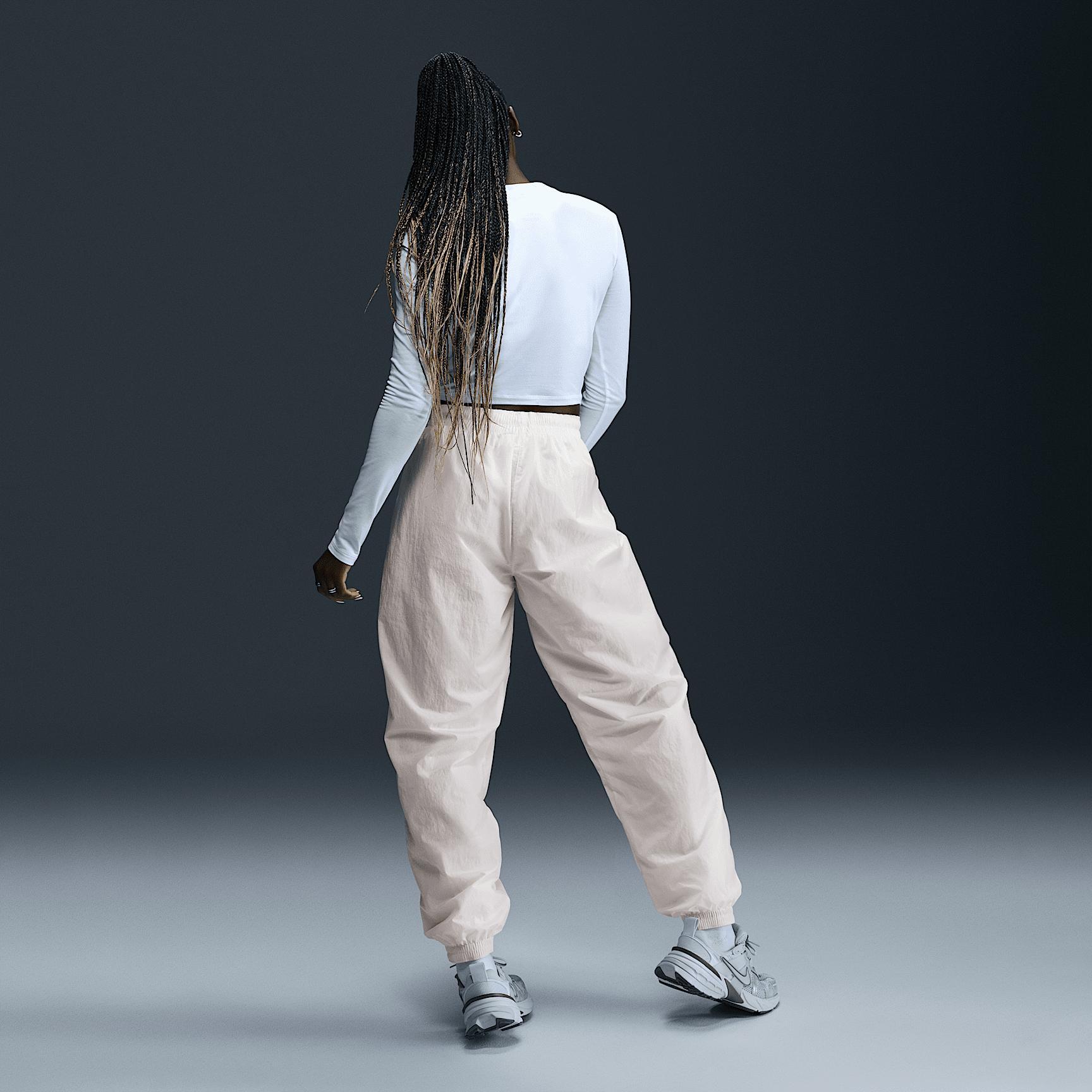 Nike Sportswear Essential Women's Mid-Rise Oversized Woven Joggers Product Image