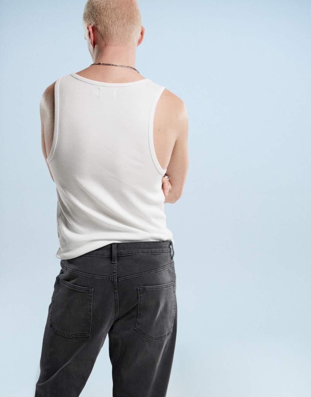 ASOS DESIGN tapered jeans in black wash Product Image