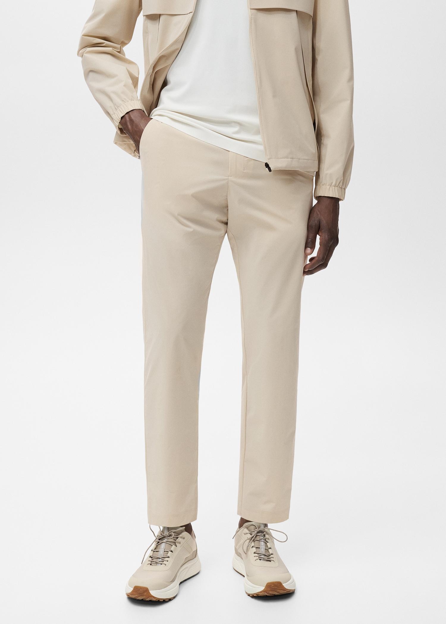 Slim-fit water-repellent pants - Men | MANGO USA Product Image