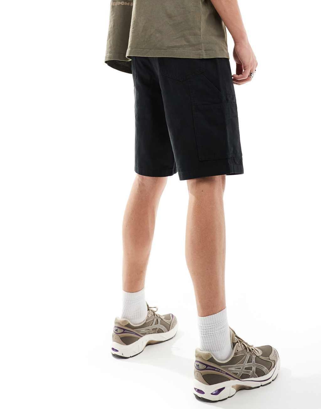ASOS DESIGN cargo shorts in black with carpenter detail Product Image