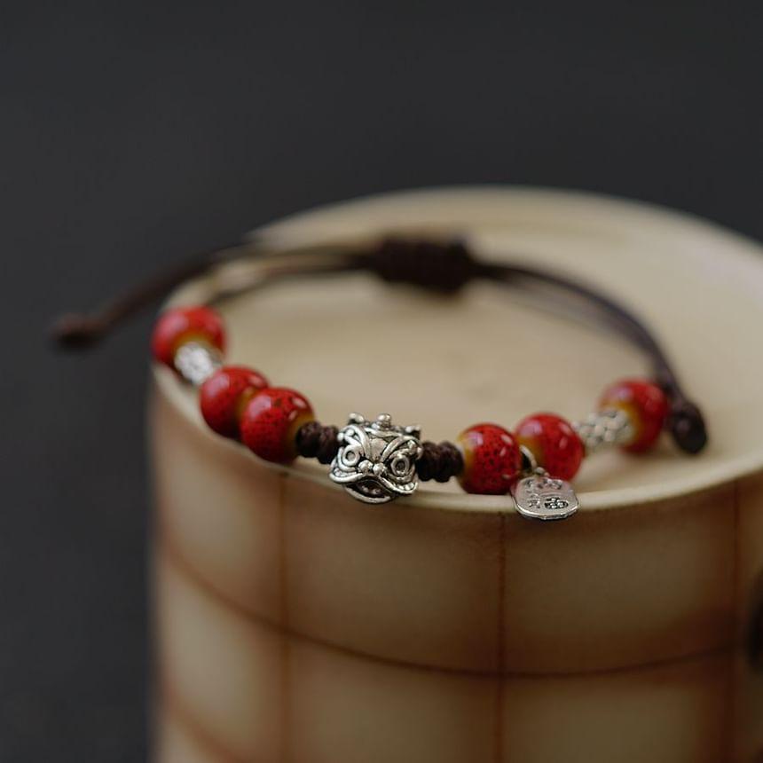 Beaded Lion Charm Bracelet Product Image