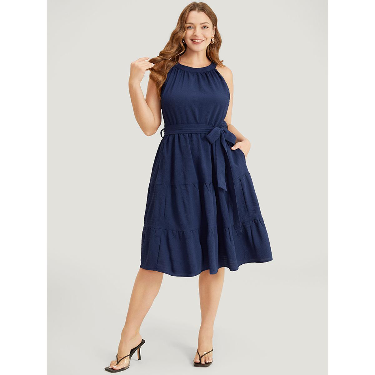 Plus Size Solid Knot Halter Pocket Belted Ruffles Tiered Hem Dress Indigo Women Elegant Gathered Halter neck Sleeveless Curvy Knee Dress BloomChic 18-20/2X Product Image