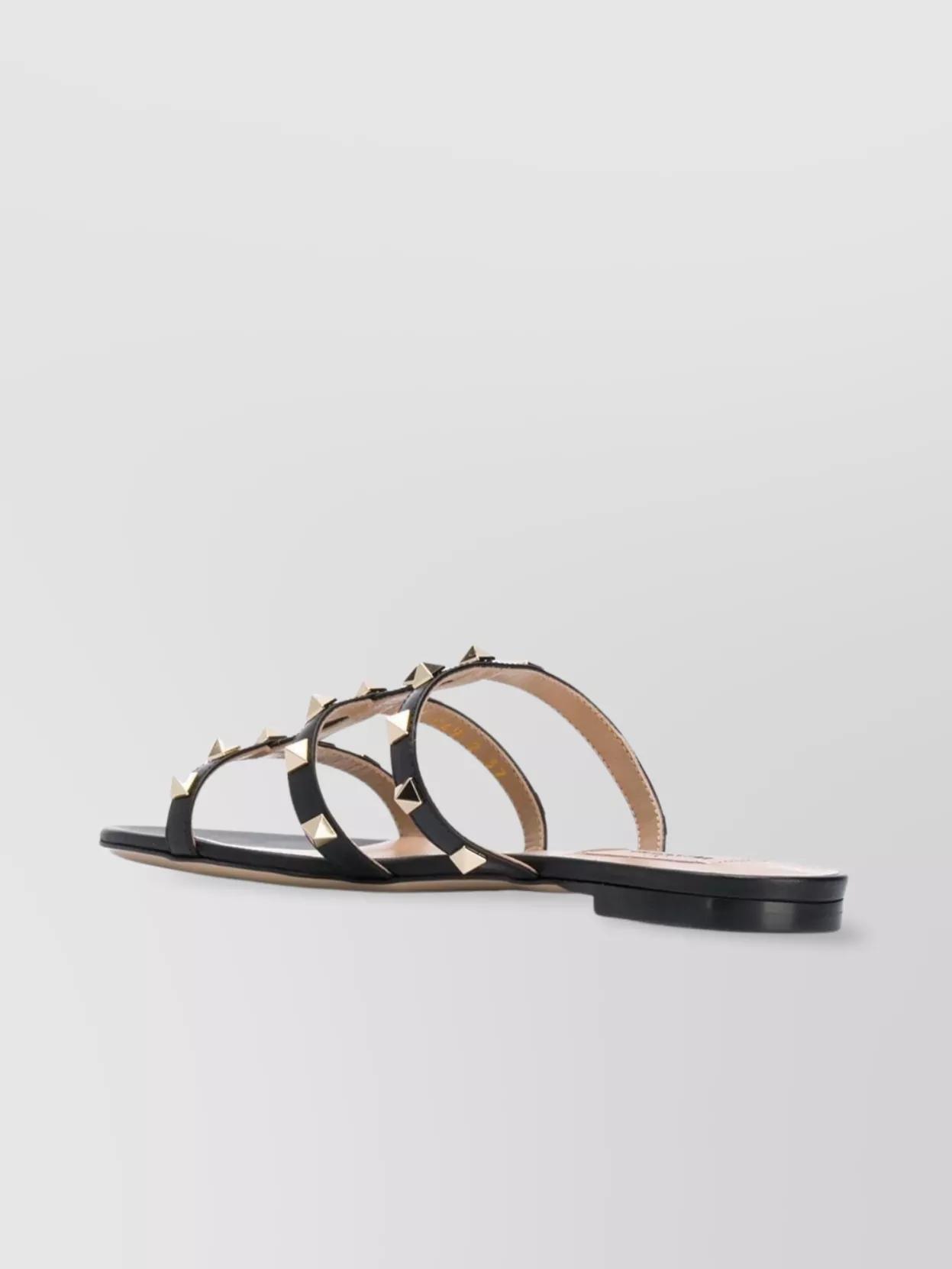 VALENTINO GARAVANI Studded Leather Flat Sandals In Black Product Image