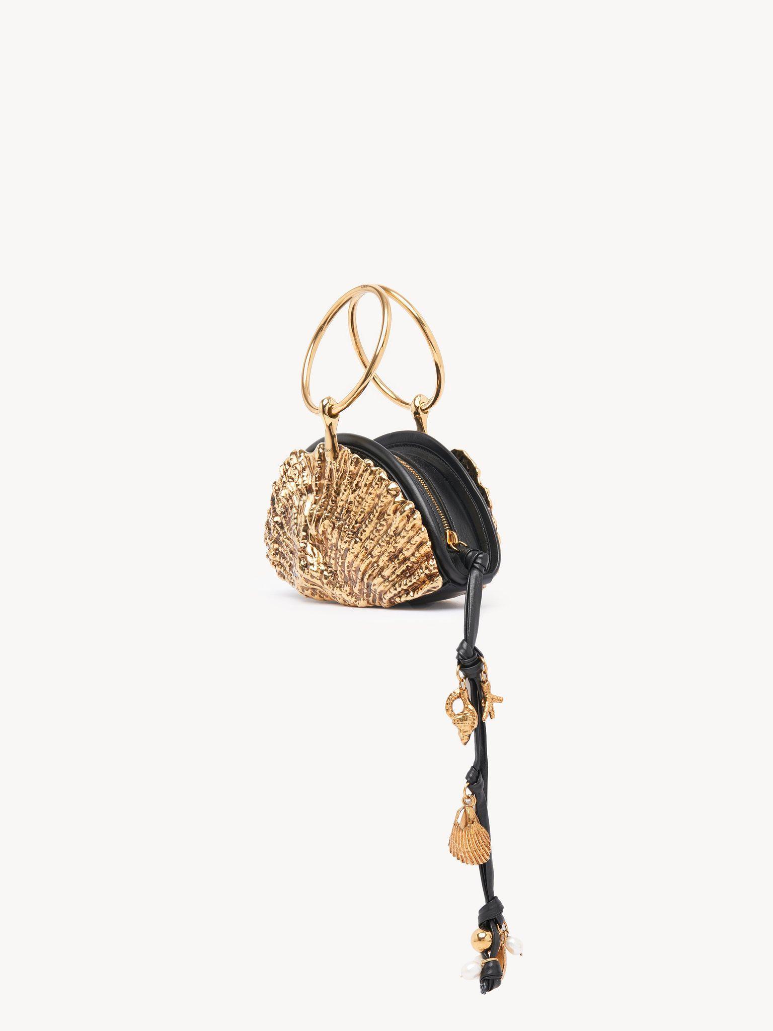 Sea Treasures Shell zipped clutch in soft leather & metal Product Image
