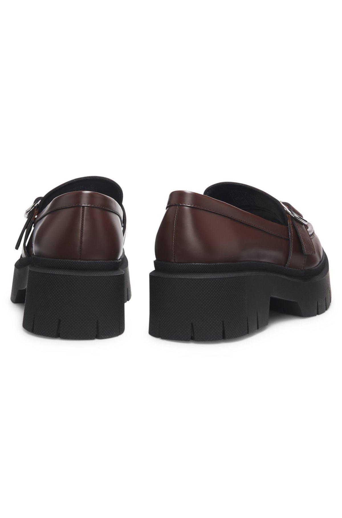 Leather loafers with buckled strap Product Image