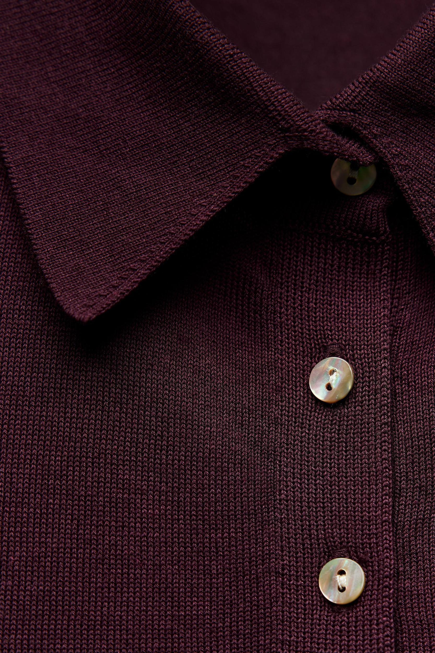 BUTTONED KNIT POLO TOP Product Image