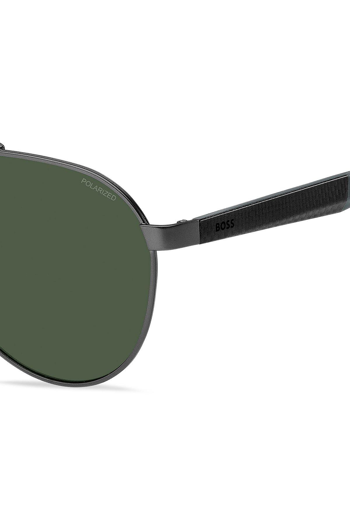 Double-bridge sunglasses with green-shaded lenses Product Image
