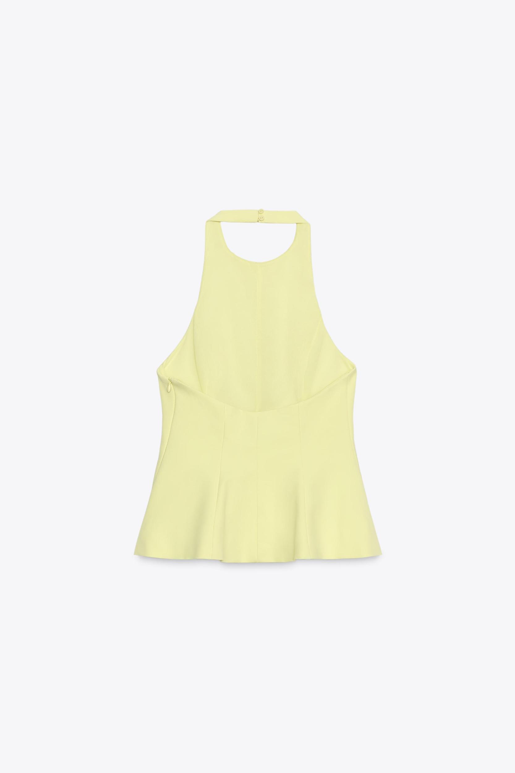 STRETCH PEPLUM TOP Product Image