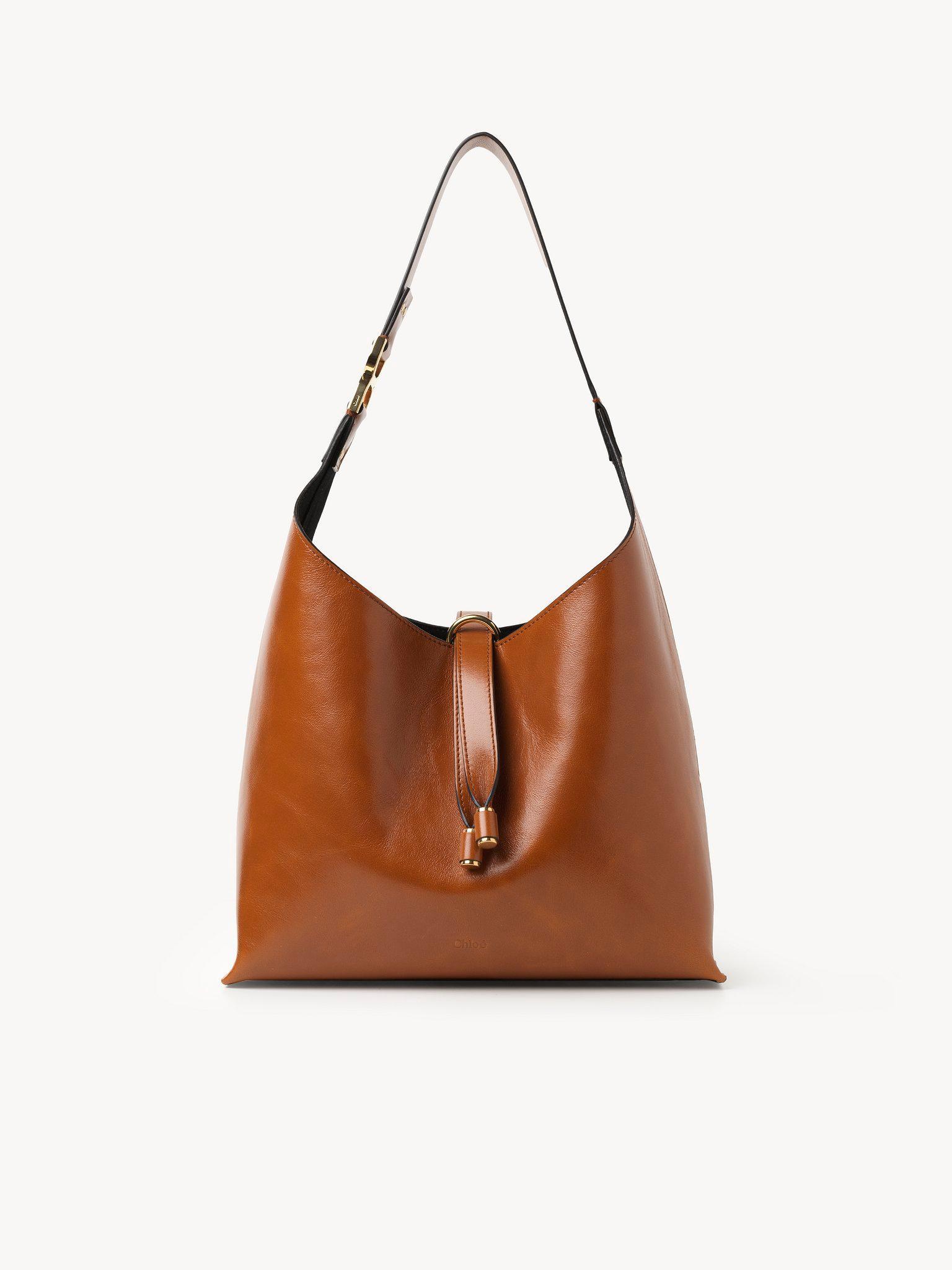 Small Marcie hobo bag in shiny leather Product Image