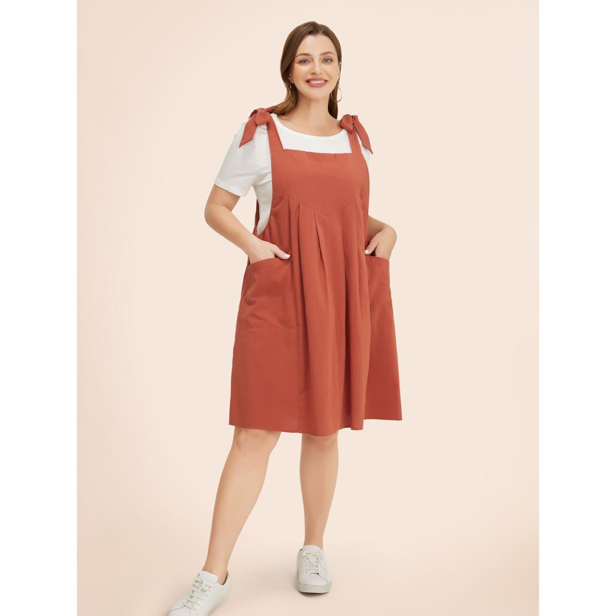 Plus Size Solid Pleated Hem Pocket Tie Shoulder Overall Dress Rust Women Casual Pleated Spaghetti Strap Sleeveless Curvy Knee Dress BloomChic 26/4X Product Image