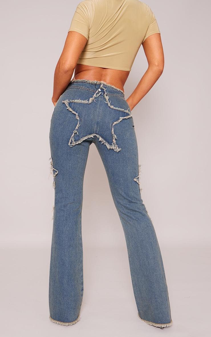 Indigo Vintage Wash Raw Hem Star Embroidery Flared Jeans Product Image