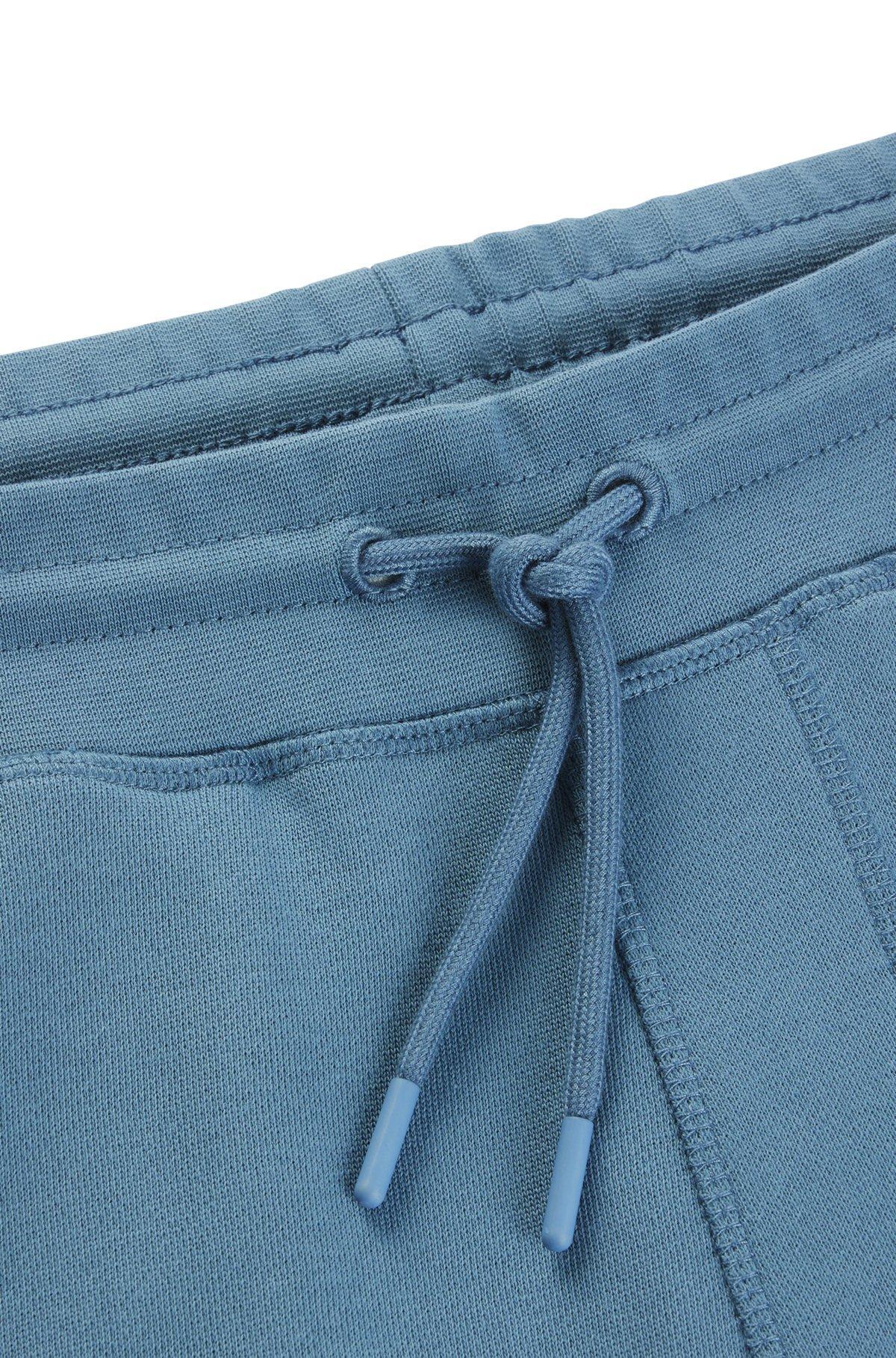 Cotton-terry tracksuit bottoms with logo patch Product Image