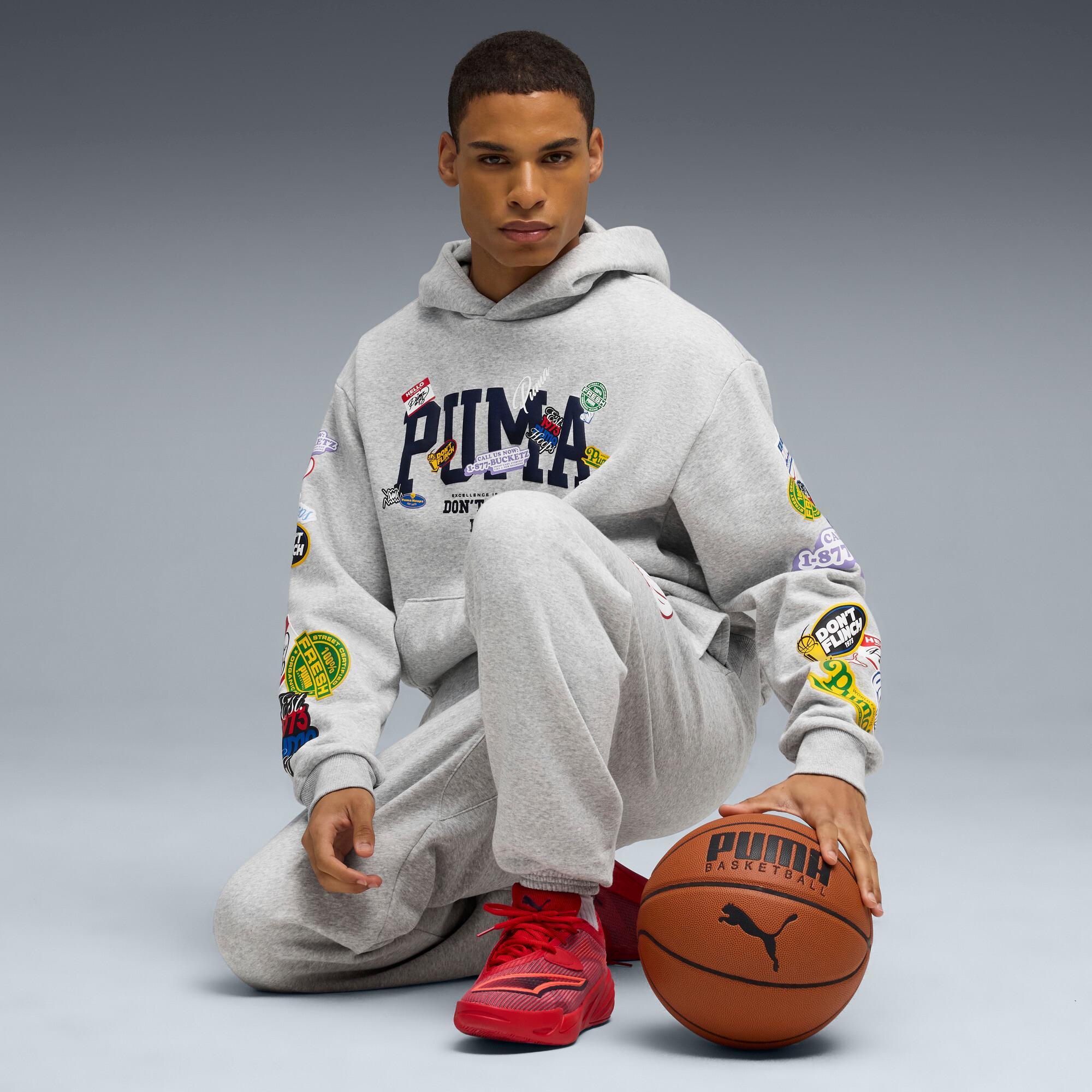 PUMA Sticker Pack Pullover Hoodie Men in Grey Product Image