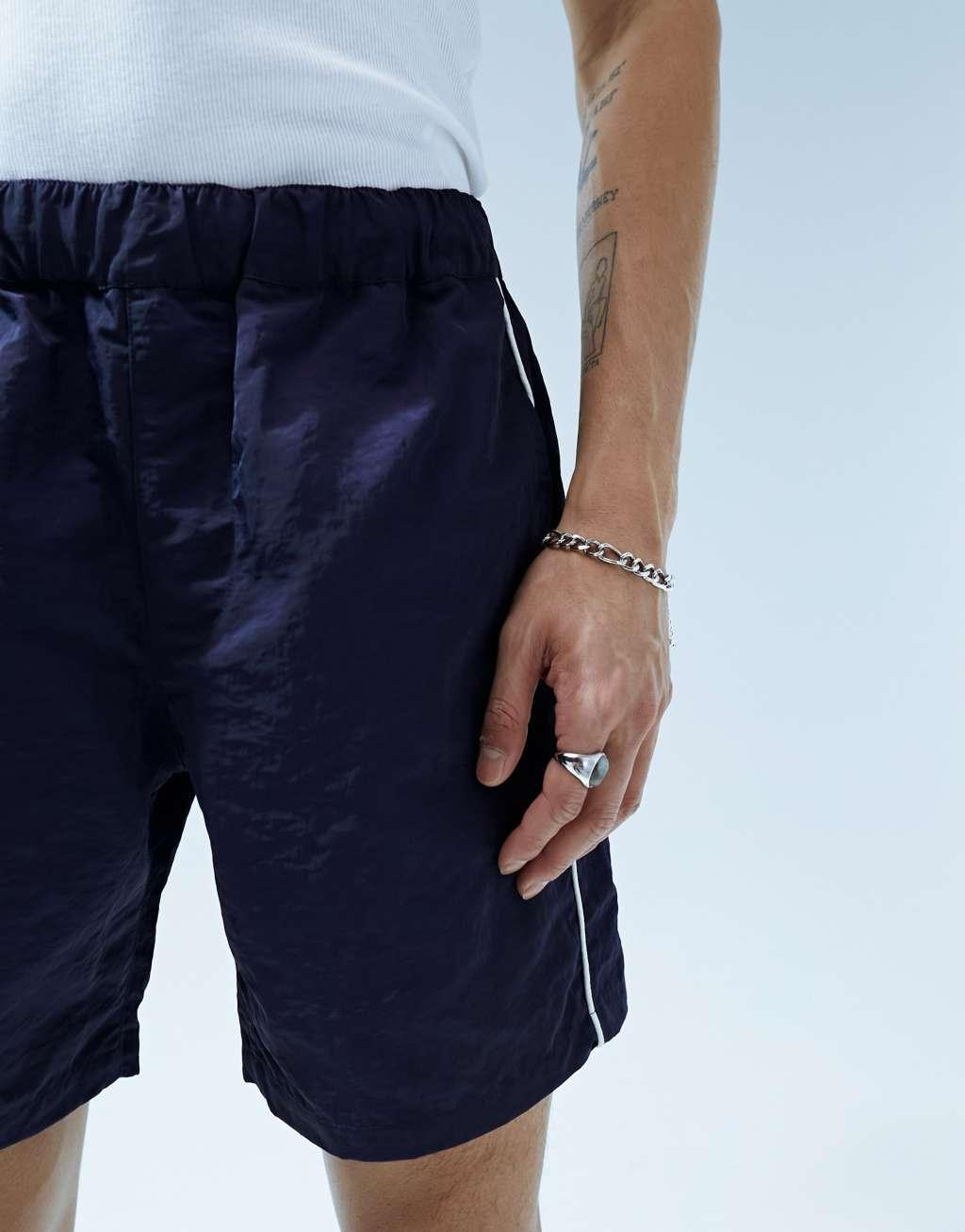 ASOS DESIGN slim nylon shorts with piping detail Product Image