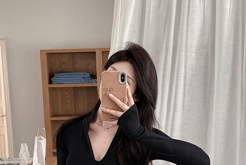 Set: Long-Sleeve Stand Collar Plain Half Zip Top + High Waist Plain Flared Pants Product Image