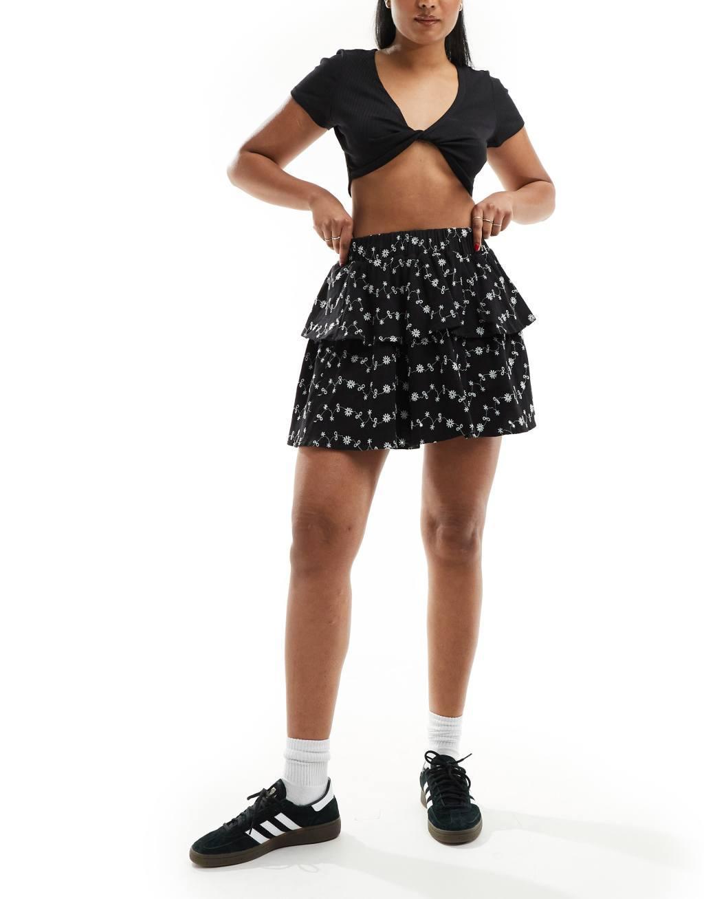 ASOS DESIGN eyelet rara mini skirt in black Product Image
